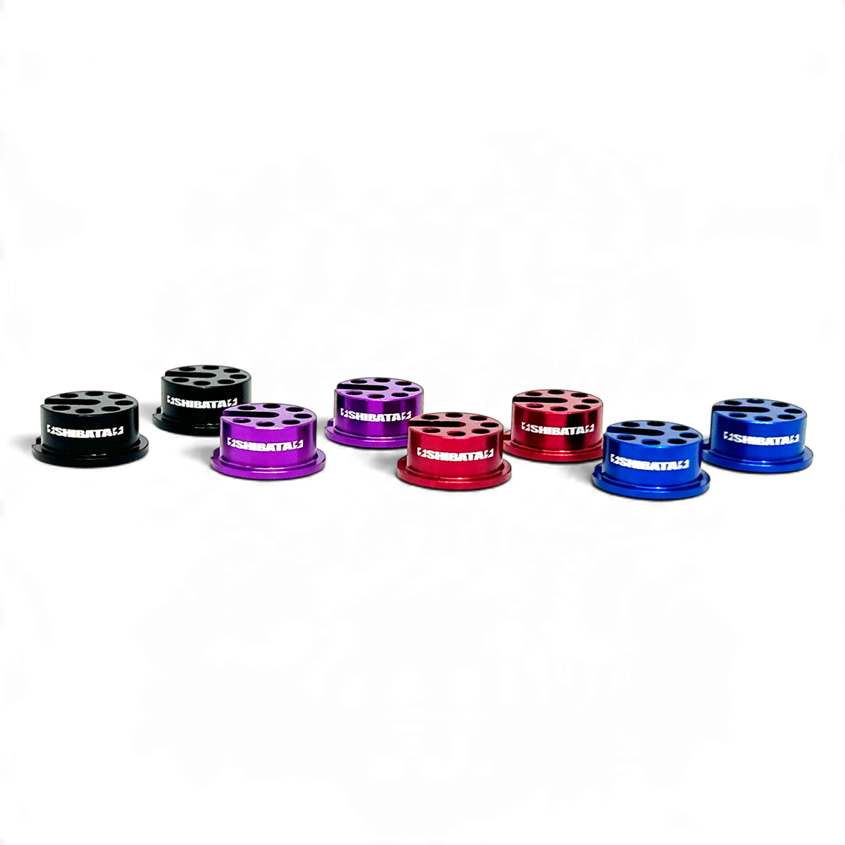 Supports de ressort en aluminium DriftParadiZ pour amortisseurs GRK, disponibles en noir, violet, rouge et bleu.
