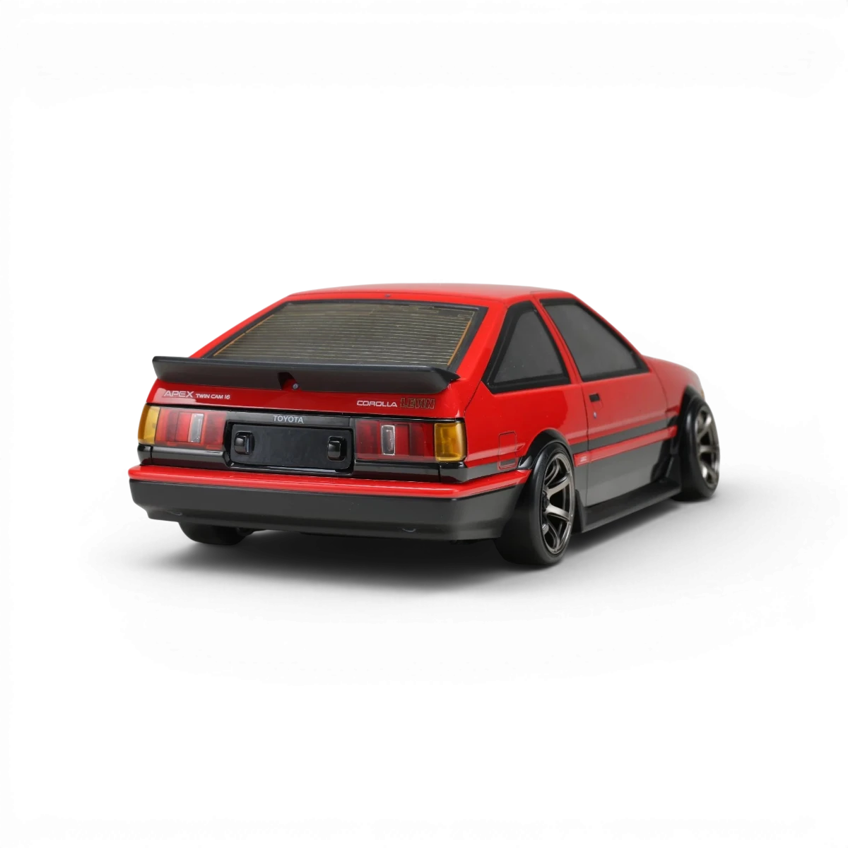 Kit de carrosserie aéro Toyota Corolla AE86 Levin 3 portes de la marque Team Yokomo, vue de face avec détails du design.
