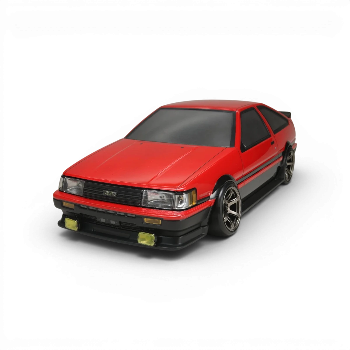 Kit de carrosserie pour Toyota Corolla AE86 Levin 3 portes, marque Team Yokomo, comprenant pièces détaillées et peintes.
