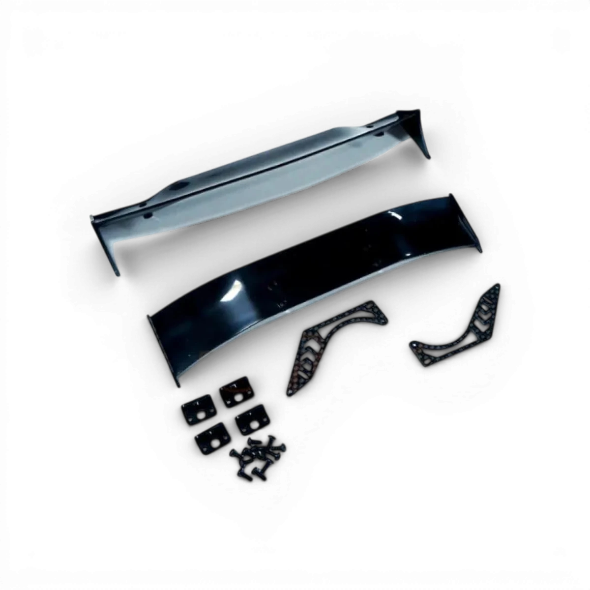 Aileron Type B de Yeah Racing pour voiture RC, en plastique noir avec détails de fixation visibles.