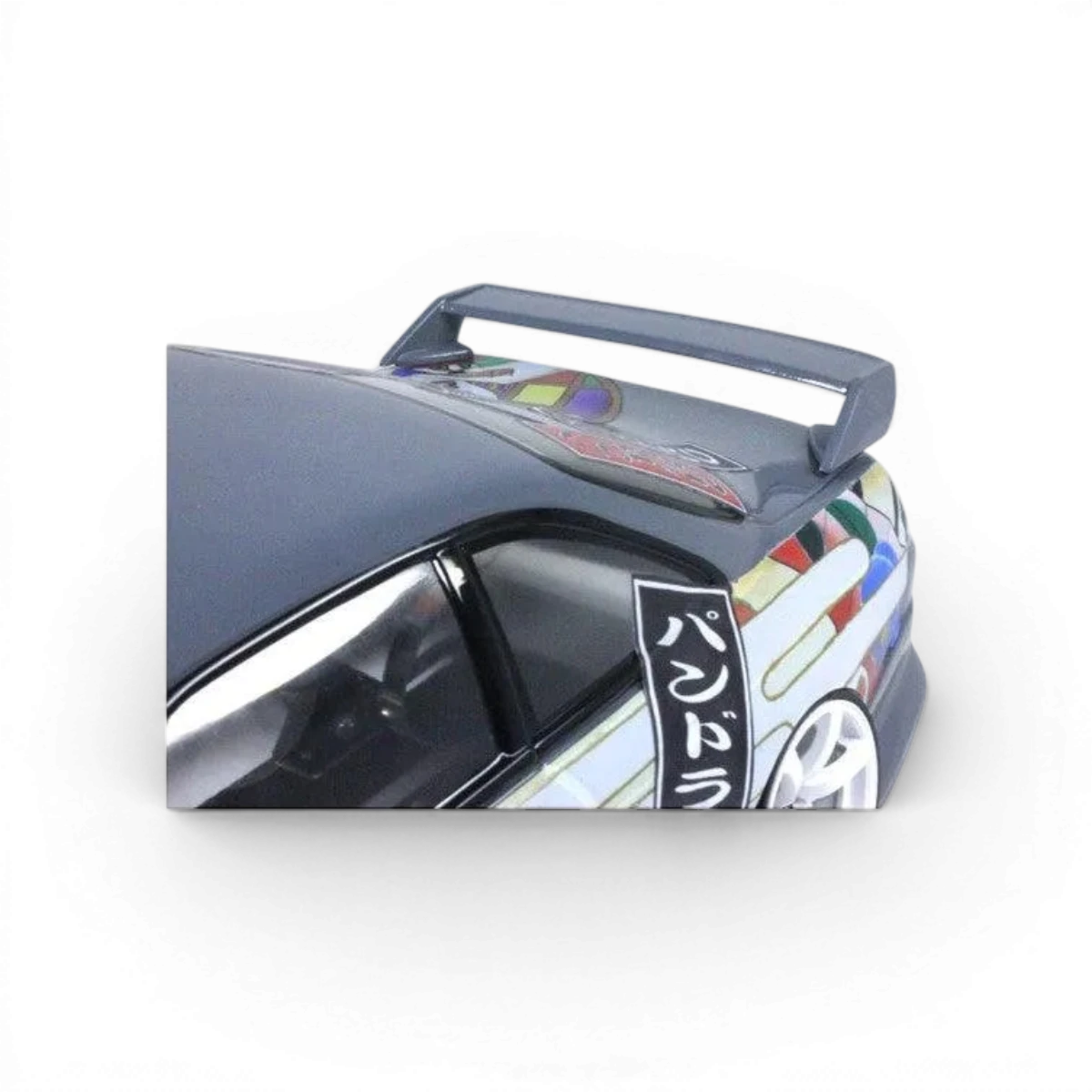 Aileron V3 Pandora RC pour customisation, vue de côté avec détails en plastique noir et composants électroniques visibles.