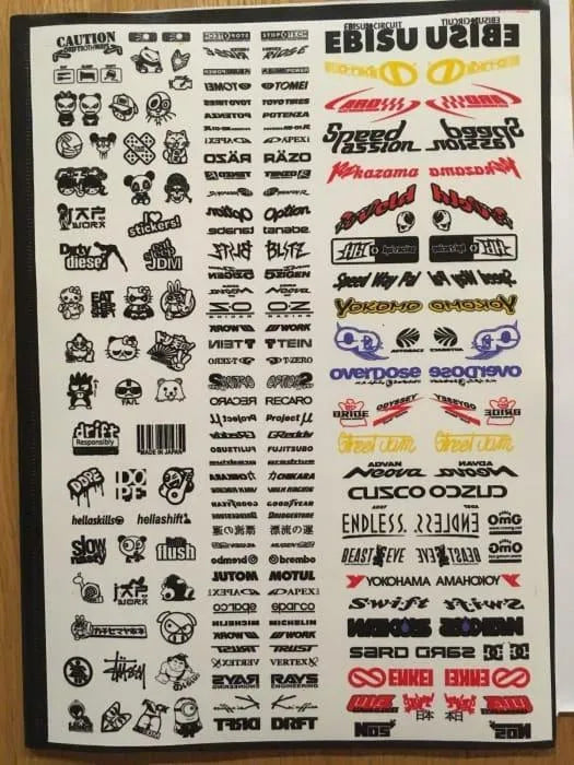 Autocollants sponsors 35 de Black Drift Stickers, design noir pour personnaliser véhicules ou accessoires.