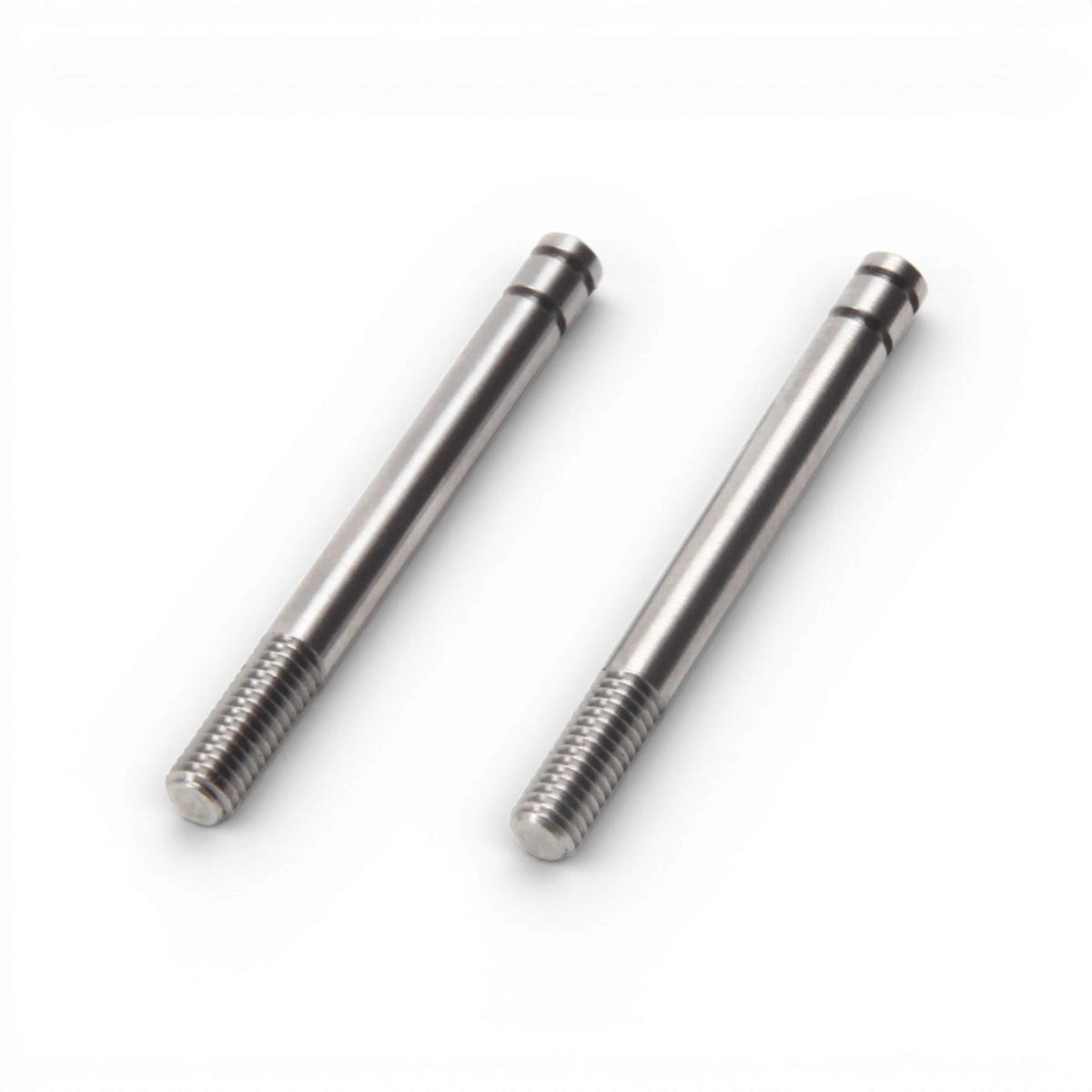 Axe d’amortisseur en titane SHIBATA 31mm, 2 pièces, pièce détachée robuste pour vélo ou moto, visible en gros plan.