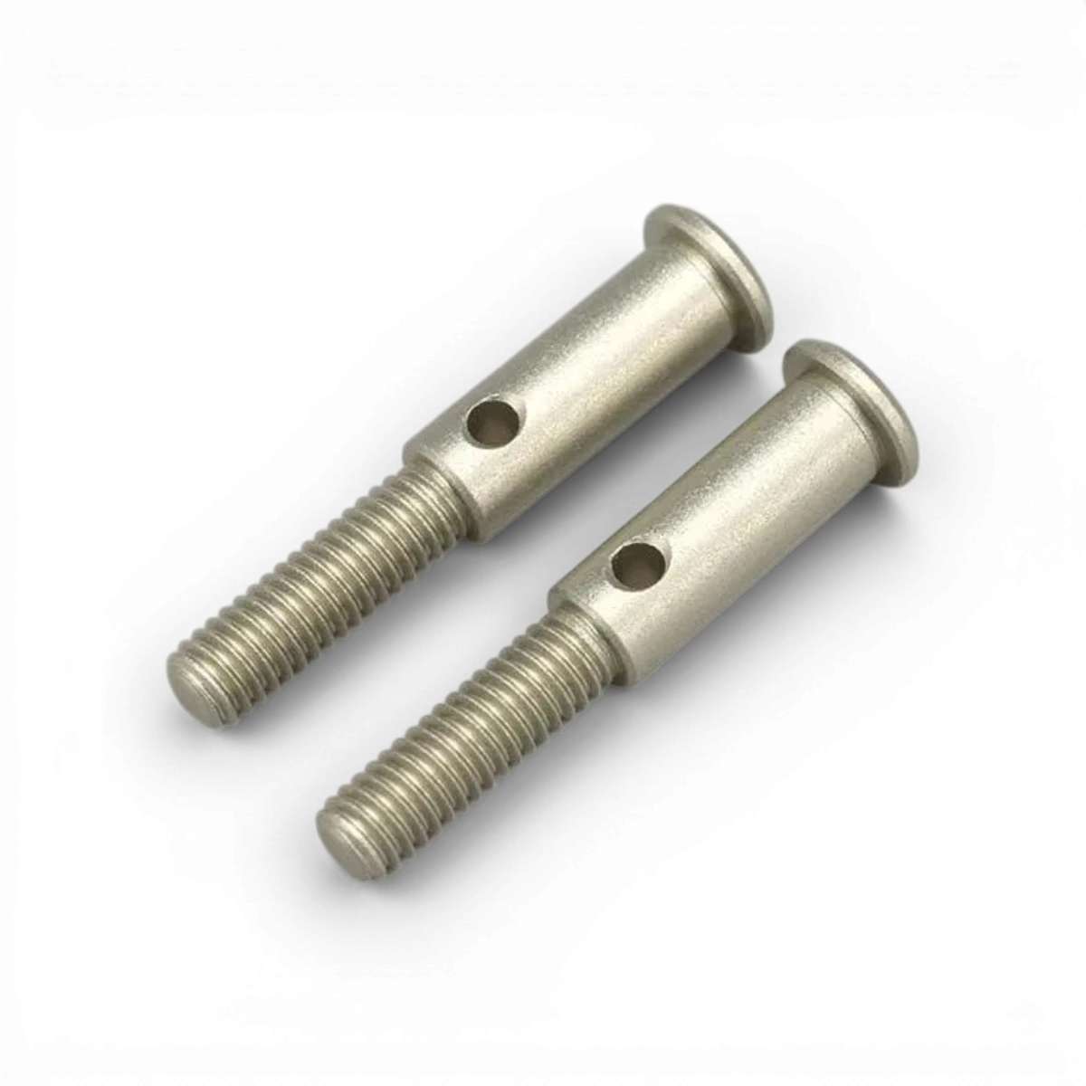 Axe fusée en aluminium pour pièces détachées Team Yokomo, visible avec détails métalliques et finition précise.