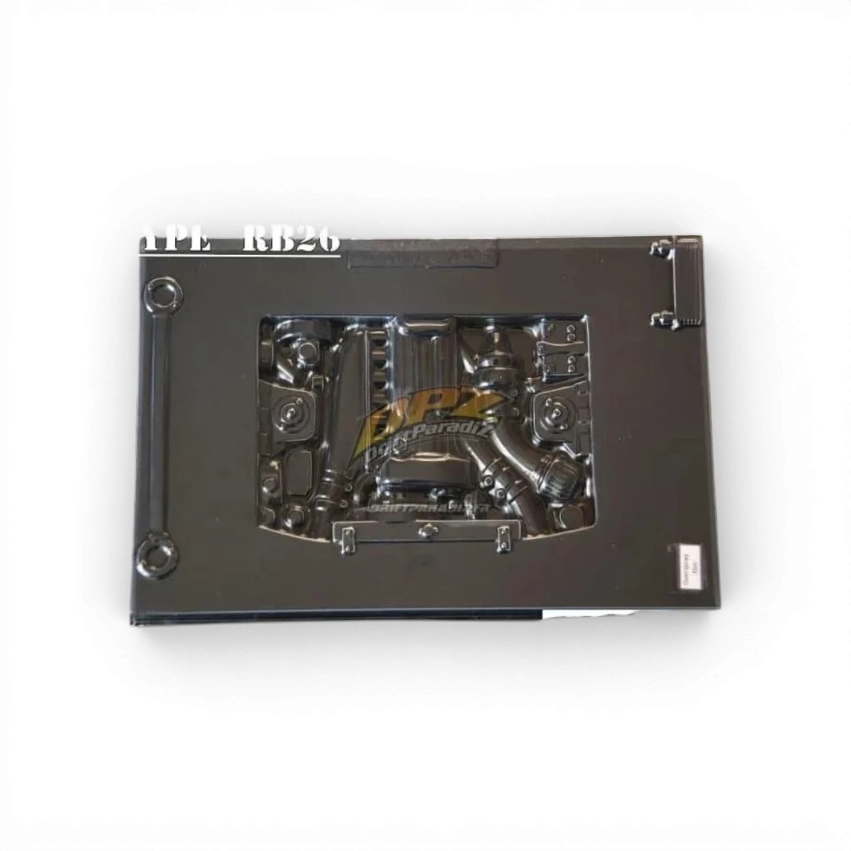 Baie moteur B26 Rotary Demi Works pour customisation, vue de face avec détails du boîtier et composants en arrière-plan.