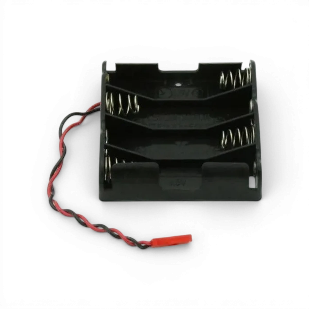 Boîtier piles radio Futaba en électronique, accessoire pour récepteur radio, couleur noire et finition compacte.