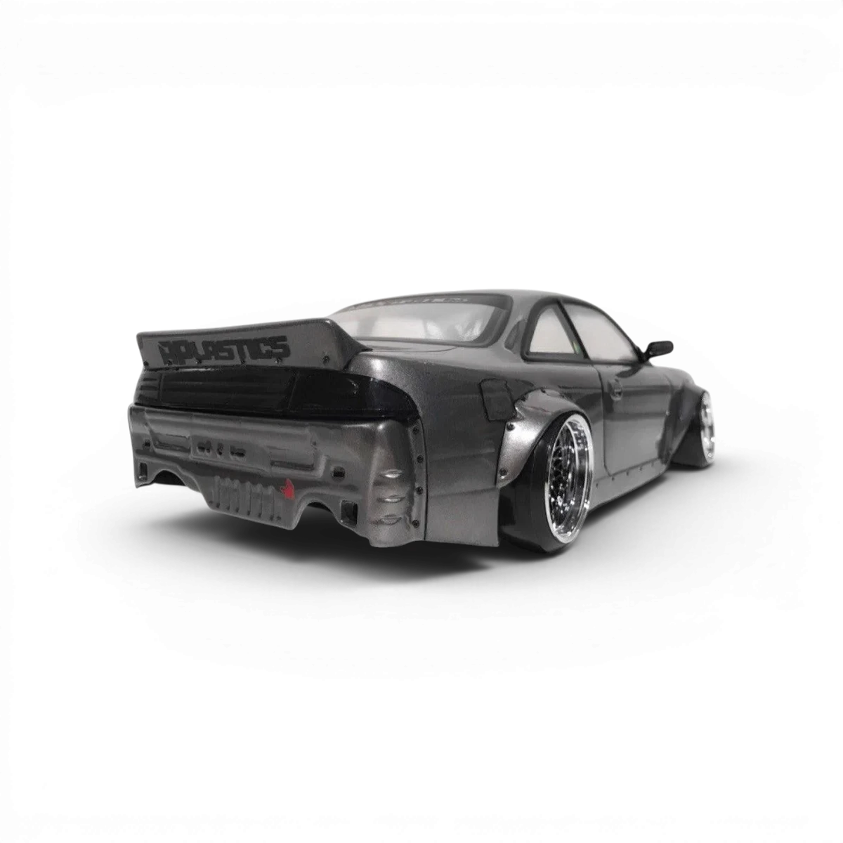 Pare-chocs arrière Boss S14 en carrosserie Aplastics RC, design sous-bumper pour Nissan S14 en style drift.