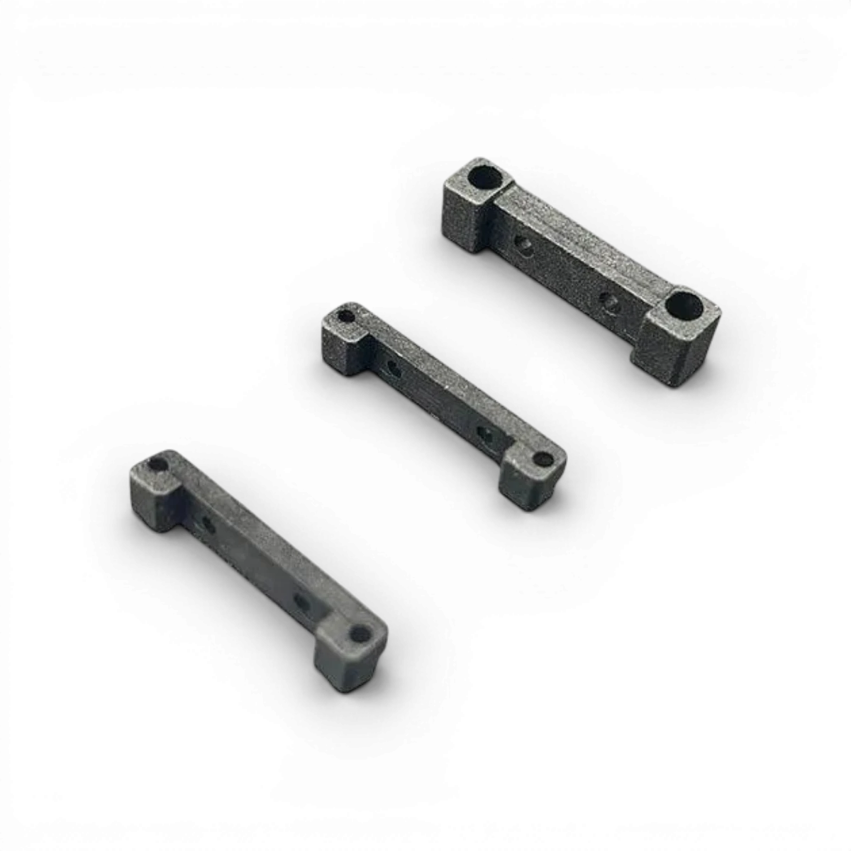 Cales triangles BMR-X BM Racing en métal, fixation robuste pour ajustement précis de l'angle de suspension.