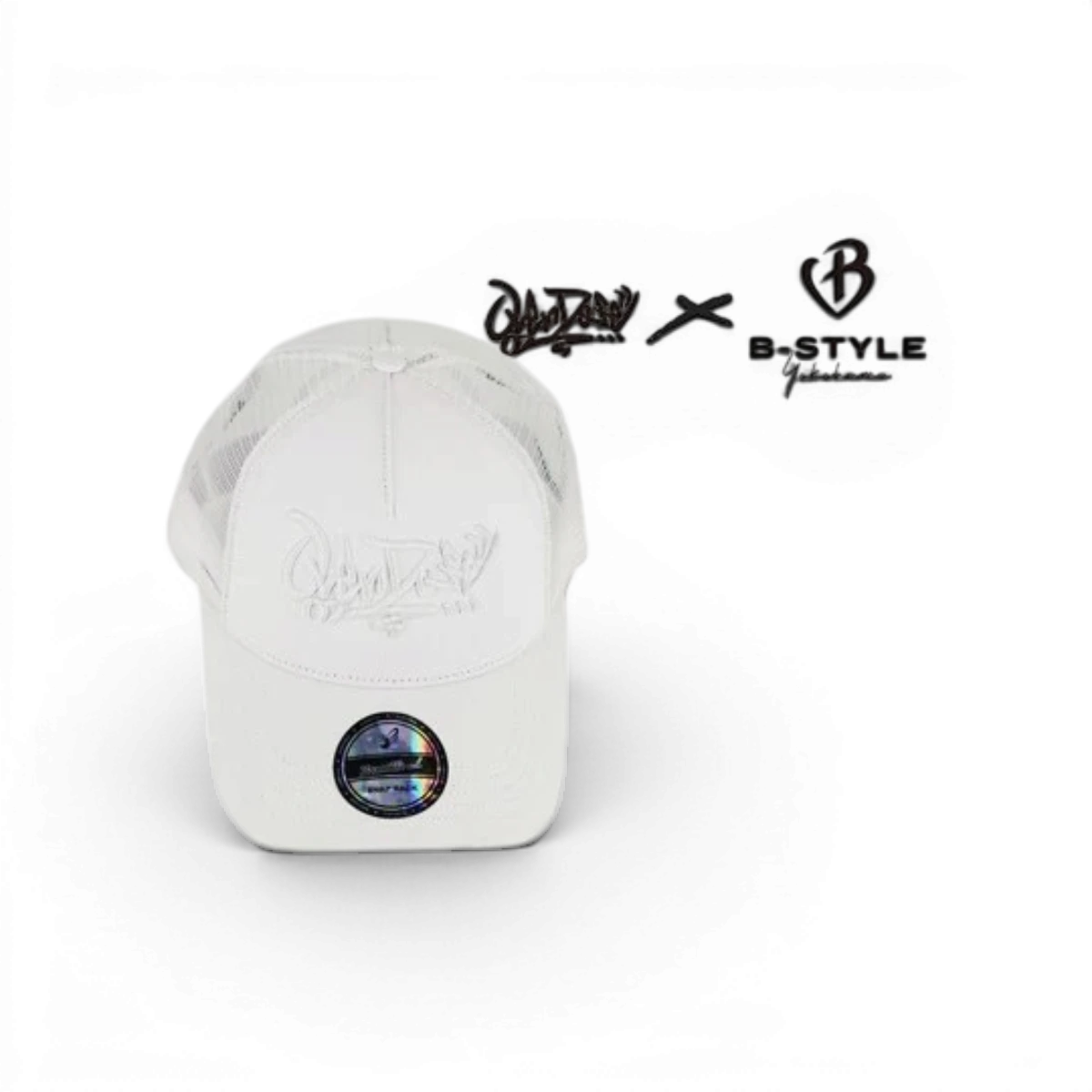 Casquette OVERDOSE × B-STYLE en mesh, disponible en noir ou blanc, accessoire de mode de la marque BuzzBreak.