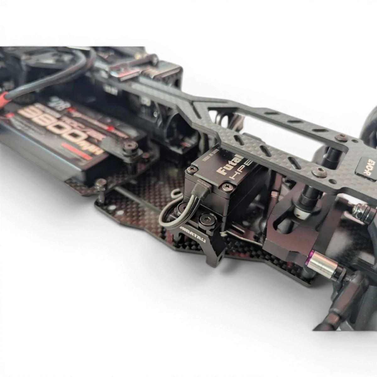 Châssis de conversion EVO-R SHIBATA pour R31S, pièces détachées pour voiture RC, en métal noir avec détails précis.
