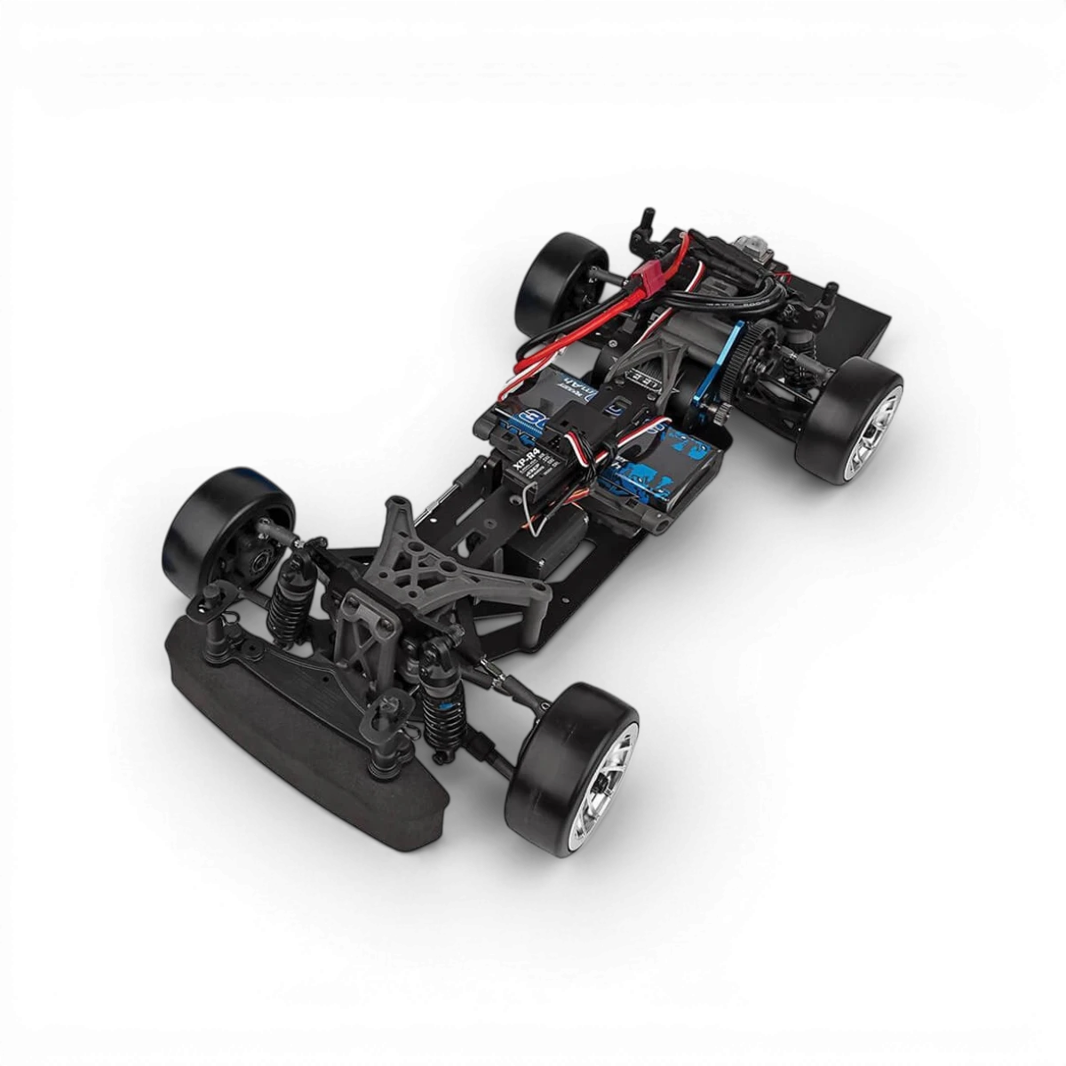 Châssis drift DC10 RTR DriftParadiZ prêt à rouler, vue de face avec détails du châssis de voiture RC.