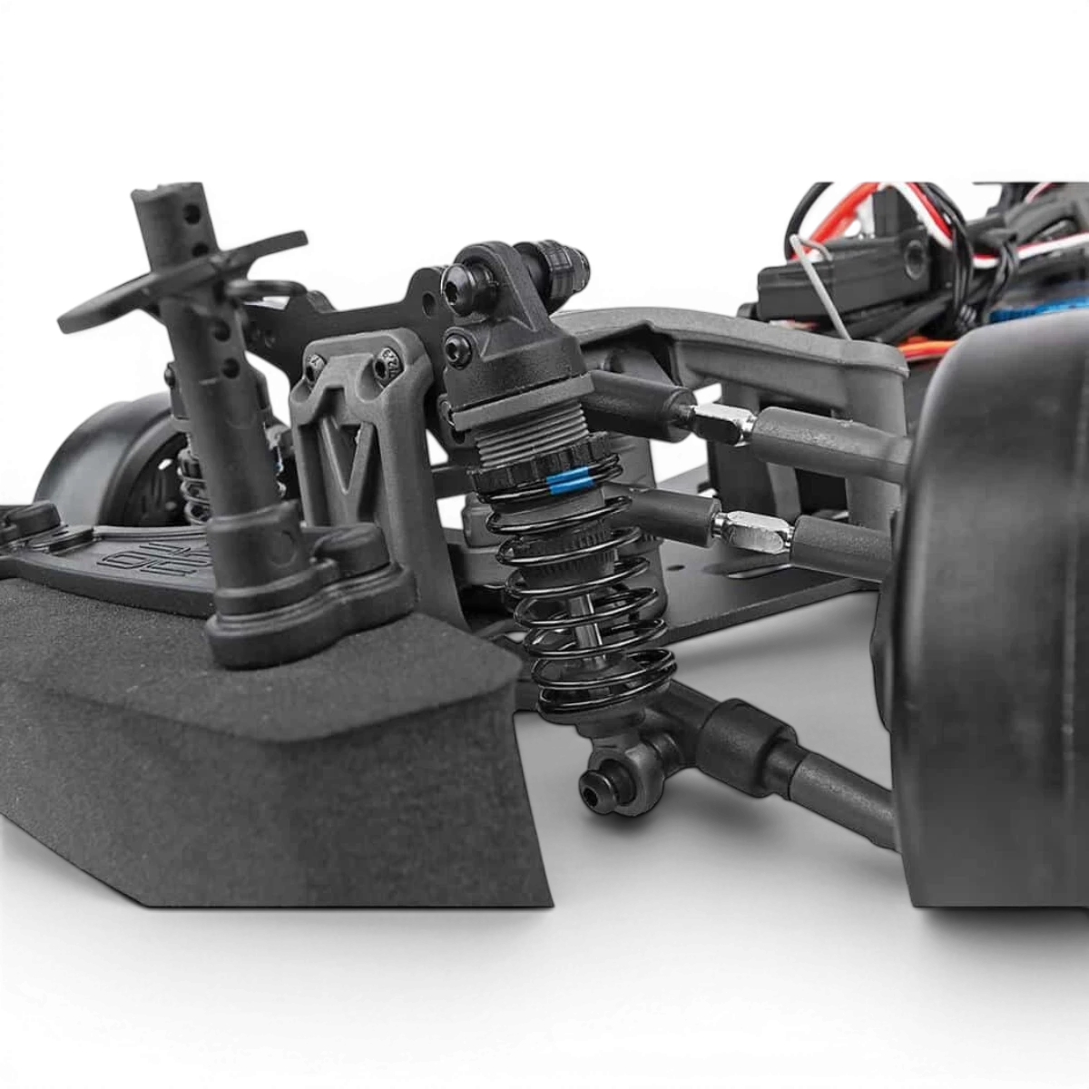 Châssis drift DC10 RTR DriftParadiZ pour voiture RC, prêt à rouler, avec détails du châssis et composants visibles.