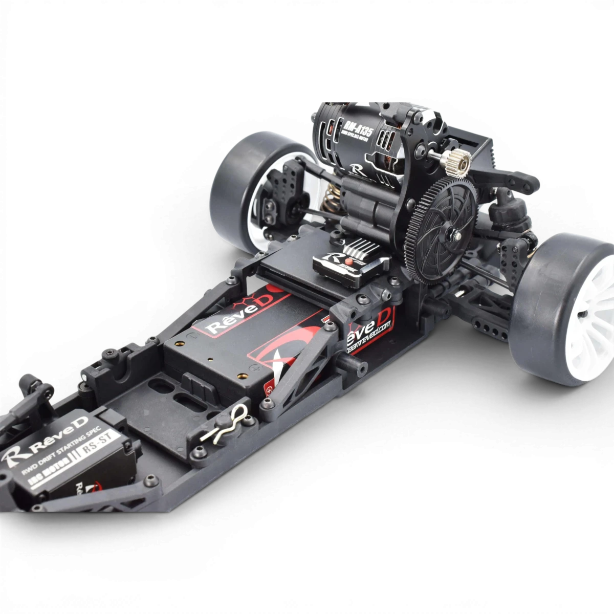 Châssis drift RDX de Team Reve D, en plastique noir avec composants métalliques pour voiture RC.