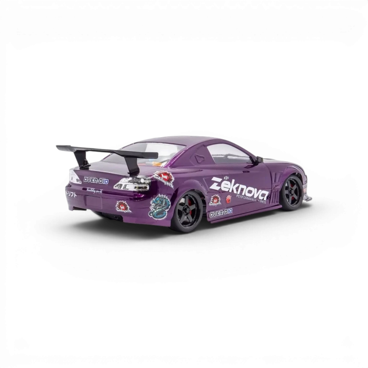 Châssis RC drift HOBBYTECH OVER-D10 RTR Brushless RWD, vue de face montrant le châssis avec composants électroniques.