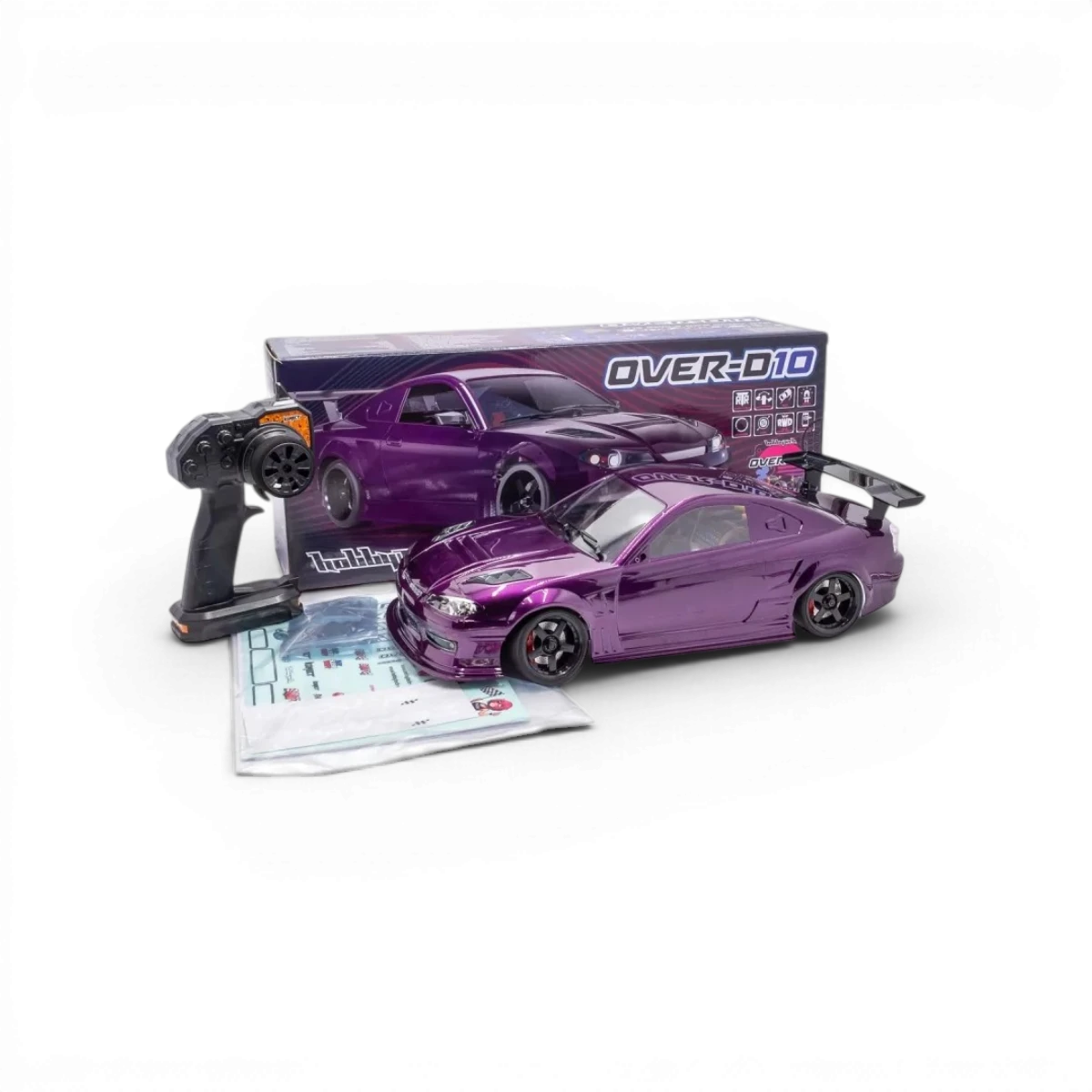 Châssis RC drift HOBBYTECH OVER-D10 RTR brushless RWD, vue de face avec composants et pneus de drift visibles.