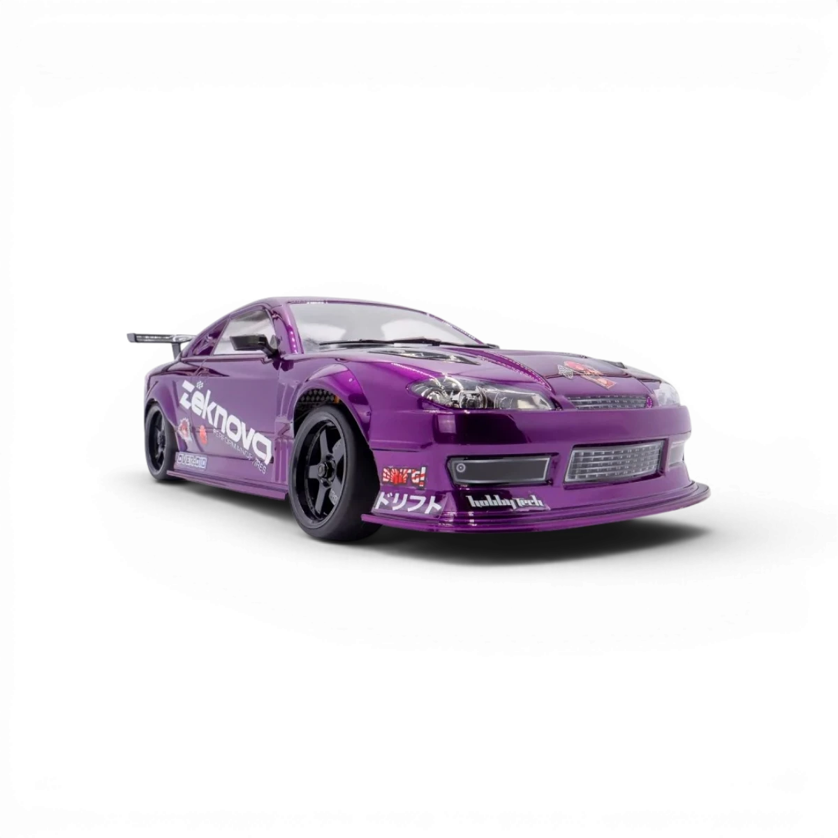 Châssis RC drift HOBBYTECH OVER-D10 RTR Brushless RWD, vue de face montrant les composants du pack.