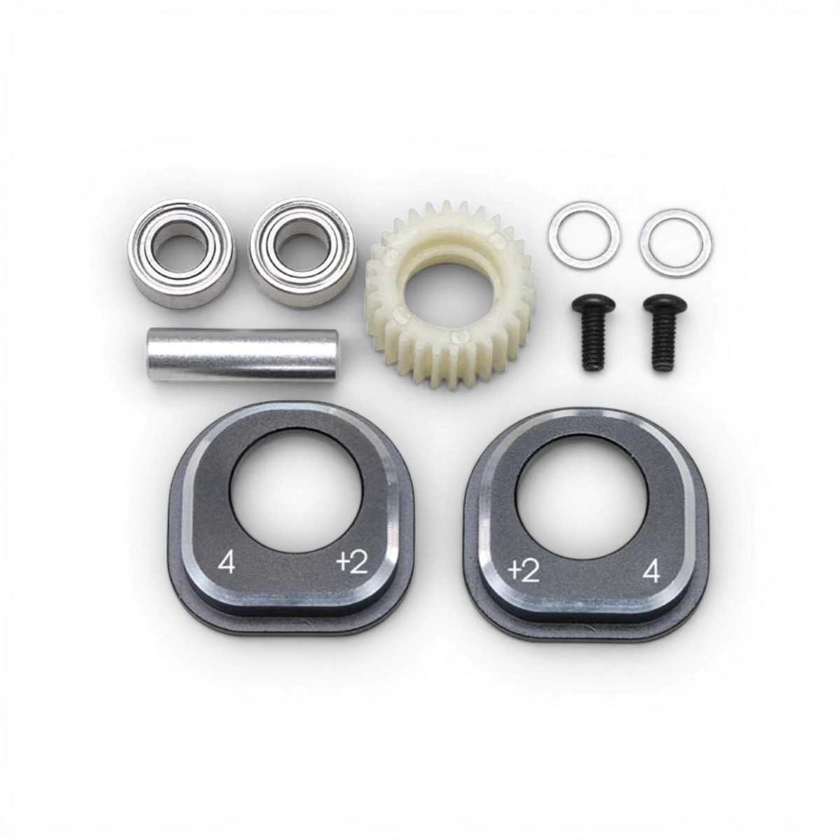 Pièces détachées Conversion 4 pignons MD 1.0 de Team Yokomo, composants pour modèle RC, vue détaillée en image.