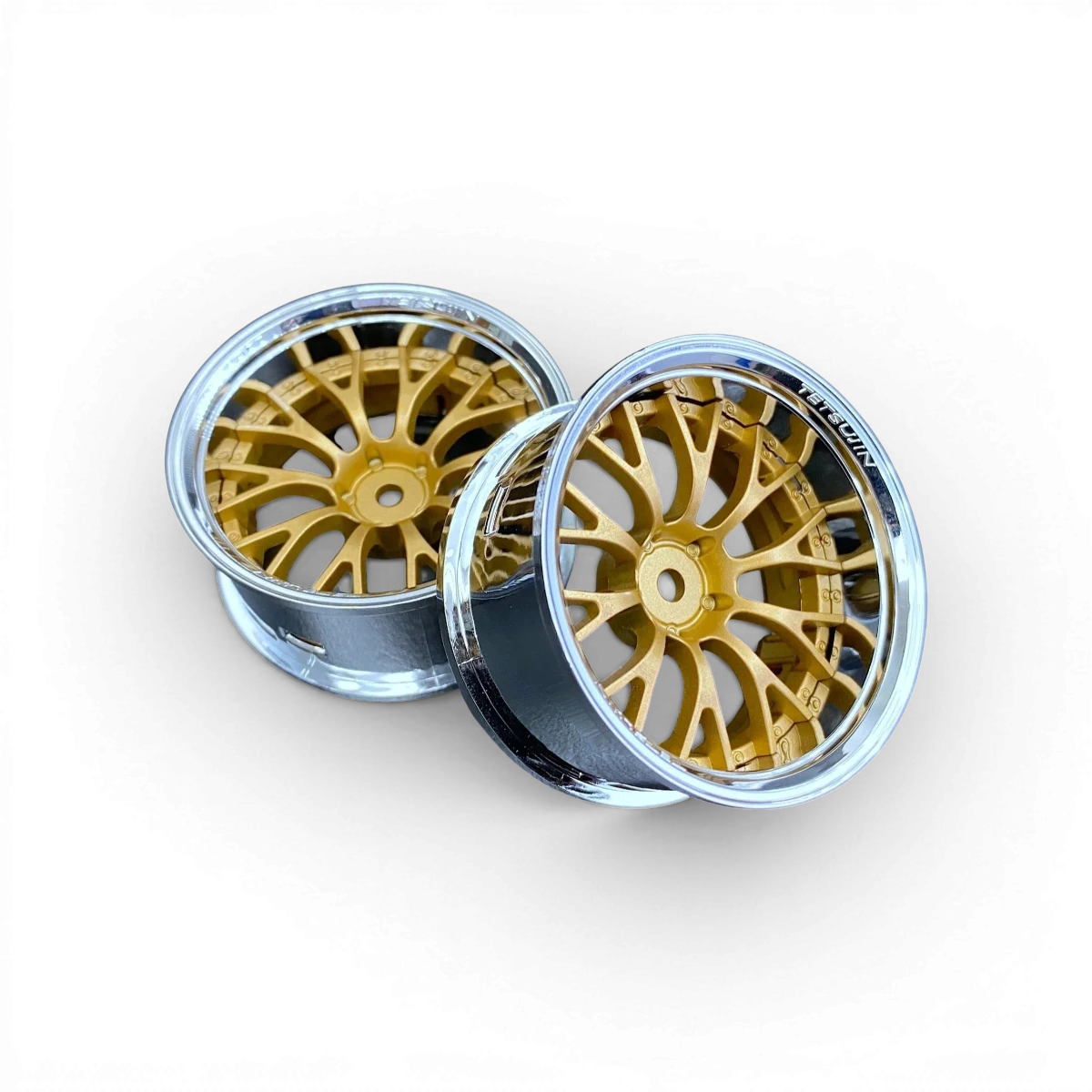 Roues Daisy Bronze et Gris en aluminium Tetsujin, design moderne pour vélo ou skateboard, visible sur l'image.