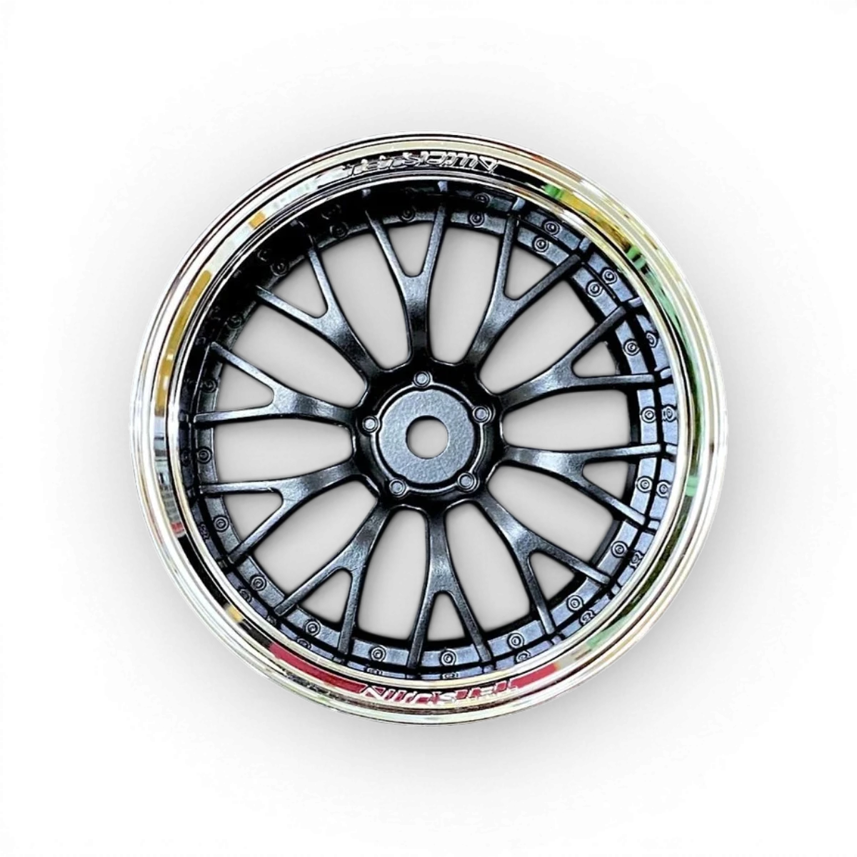 Ensemble de roues Tetsujin Daisy en chrome et noir, avec jantes élégantes et design moderne, visibles sur fond blanc.