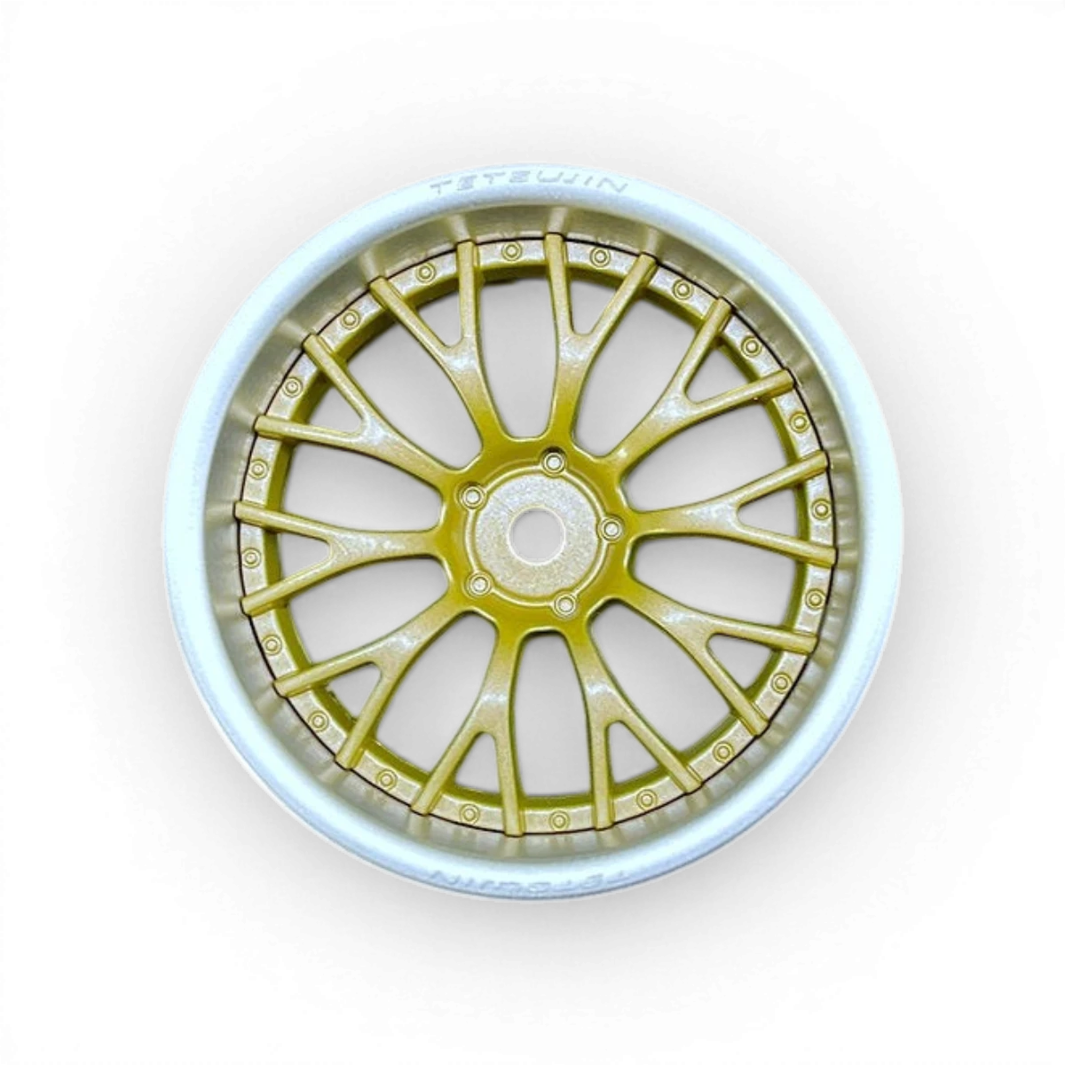 Roues Daisy Gris en aluminium et or de la marque Tetsujin, avec finition élégante et détails visibles sur l'image.