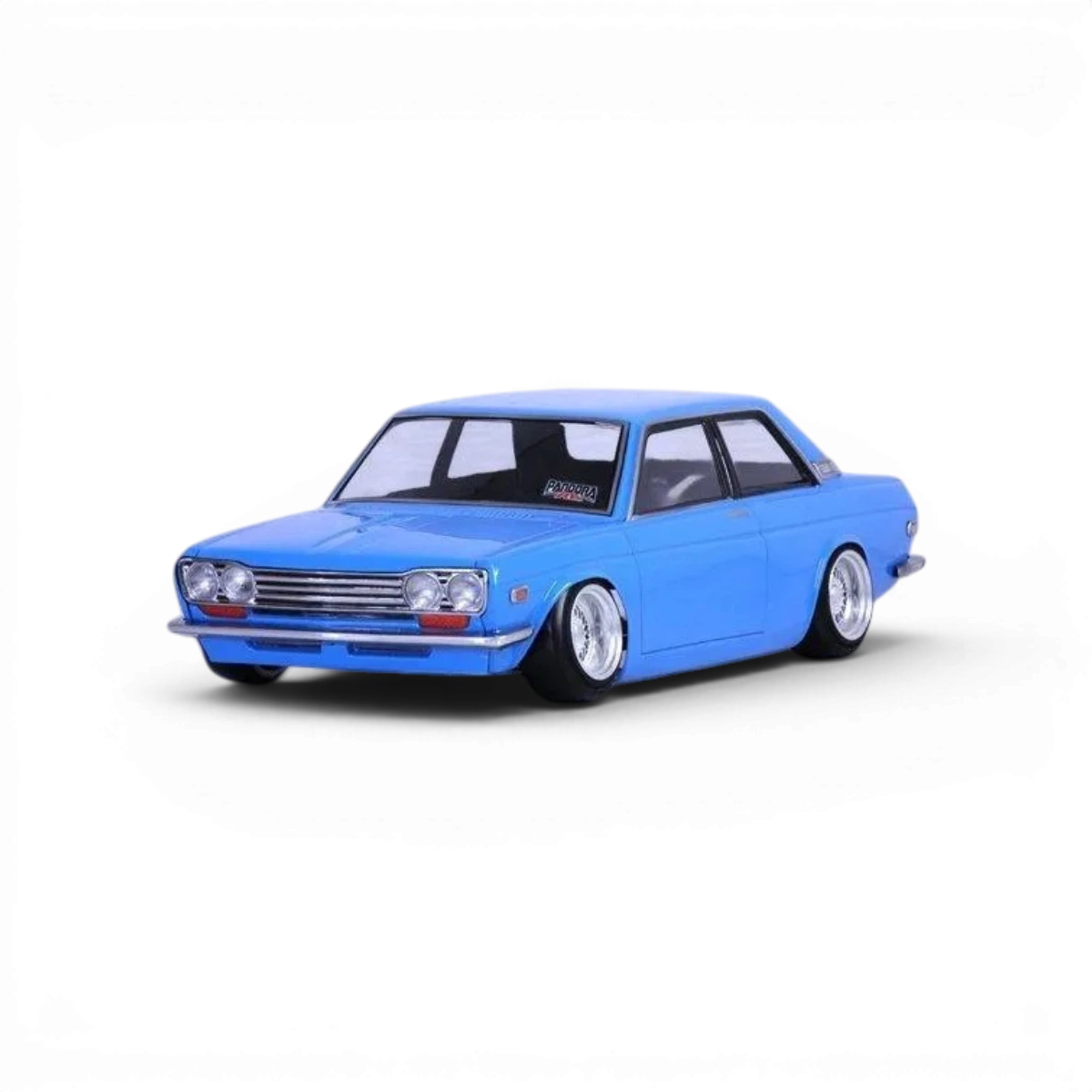 Carrosserie Pandora RC Datsun 510 Blue Bird, pièce de rechange pour voiture radiocommandée, vue de face avec détails en bleu.