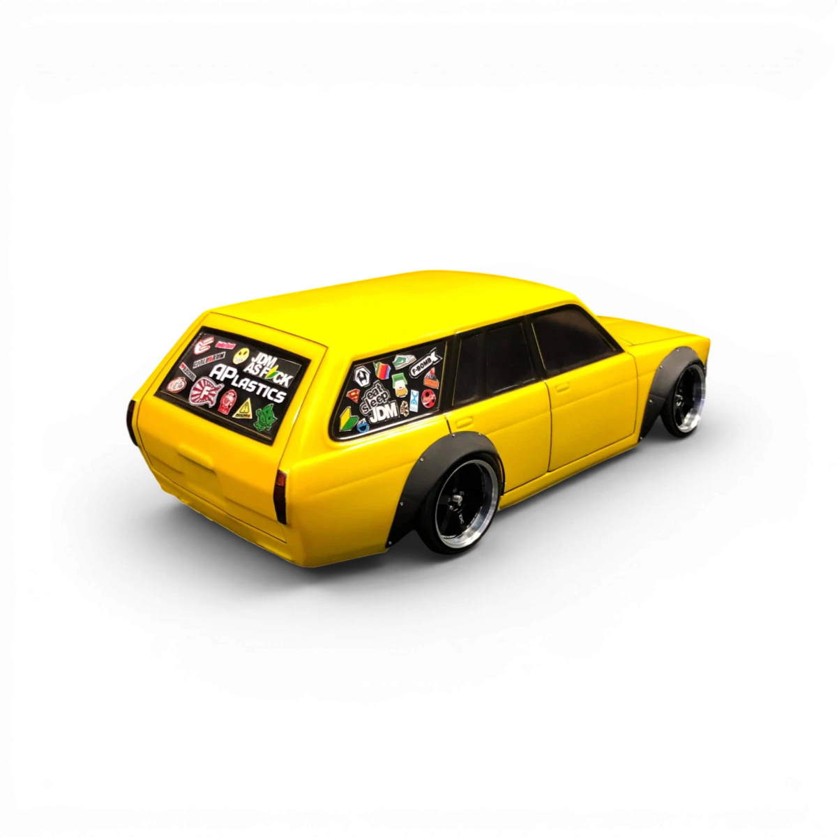 Carrosserie Datsun 510 Wagon (Break) Aplastics RC, version large, vue de face avec détails de la carrosserie en plastique.