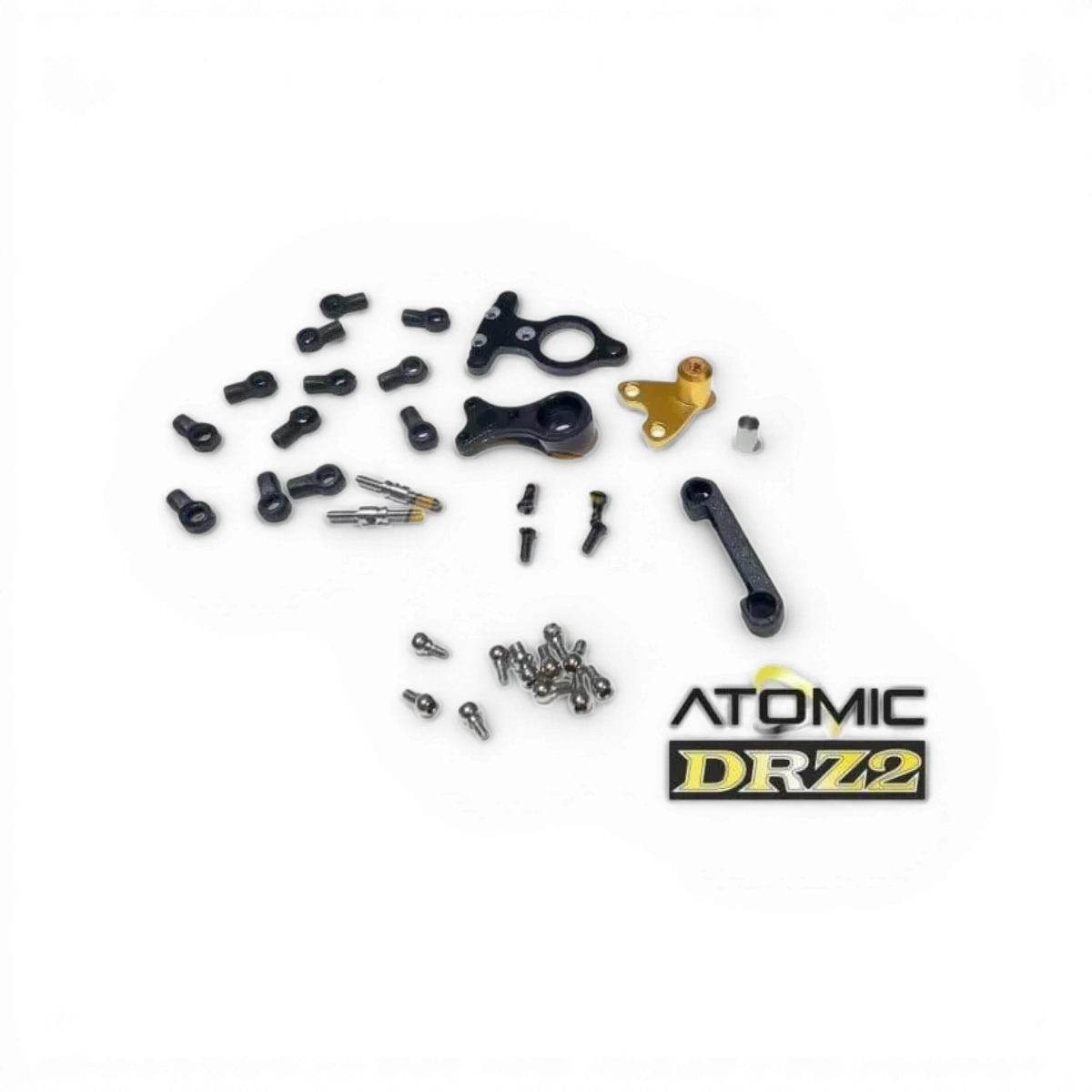 Pièces de direction DRZV2 de Atomic RC Mini, composants détachés pour modèle RC, visibles en détail.