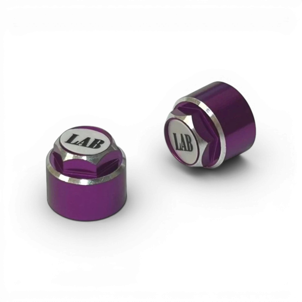 Ecrous pour jantes en violet et blanc, pièces détachées de la marque Custom lab's, image montrant des écrous de fixation.