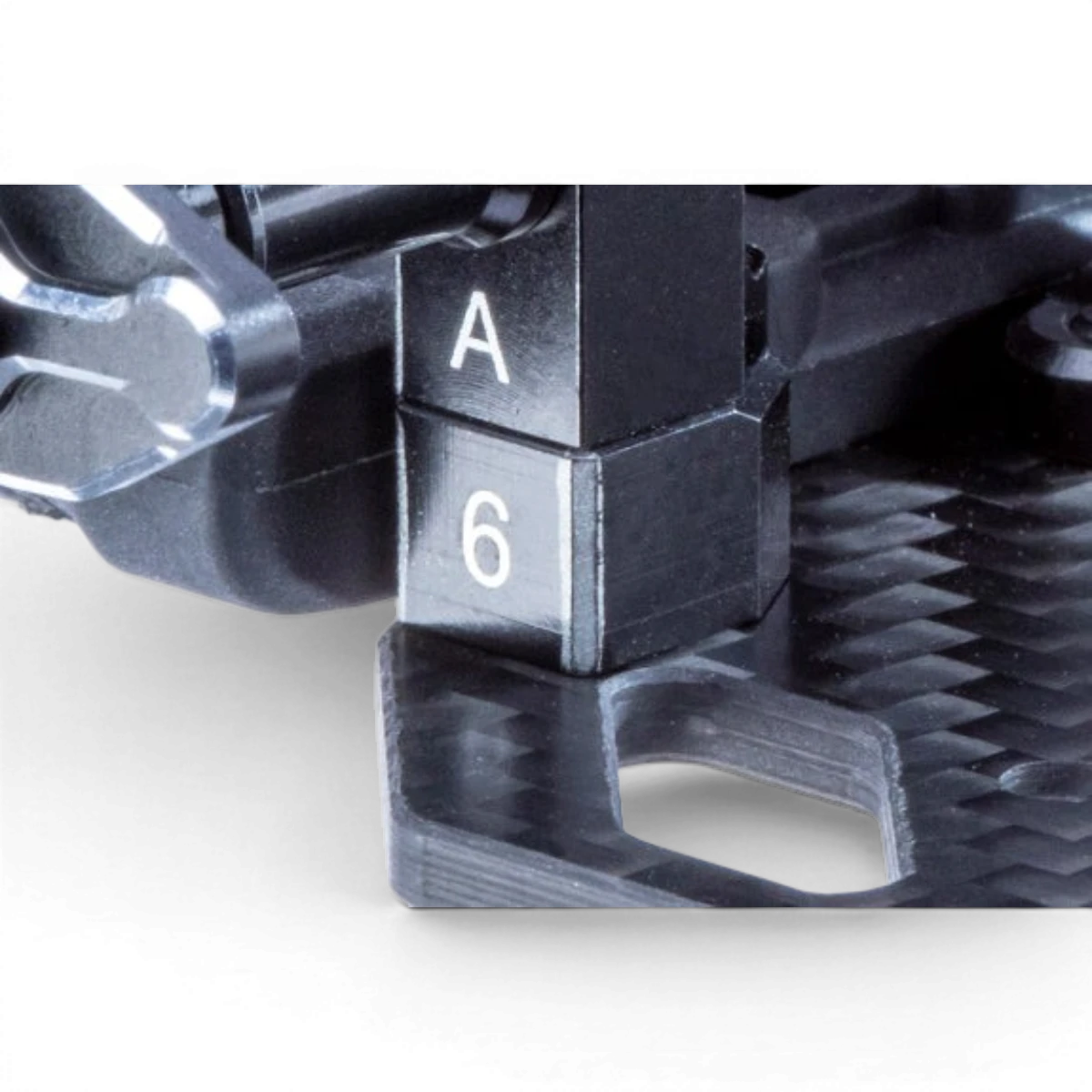 Entretoises de 6,0 mm pour support de batterie MC-III, pièces de fixation Team Reve D, visible sur le support de batterie.