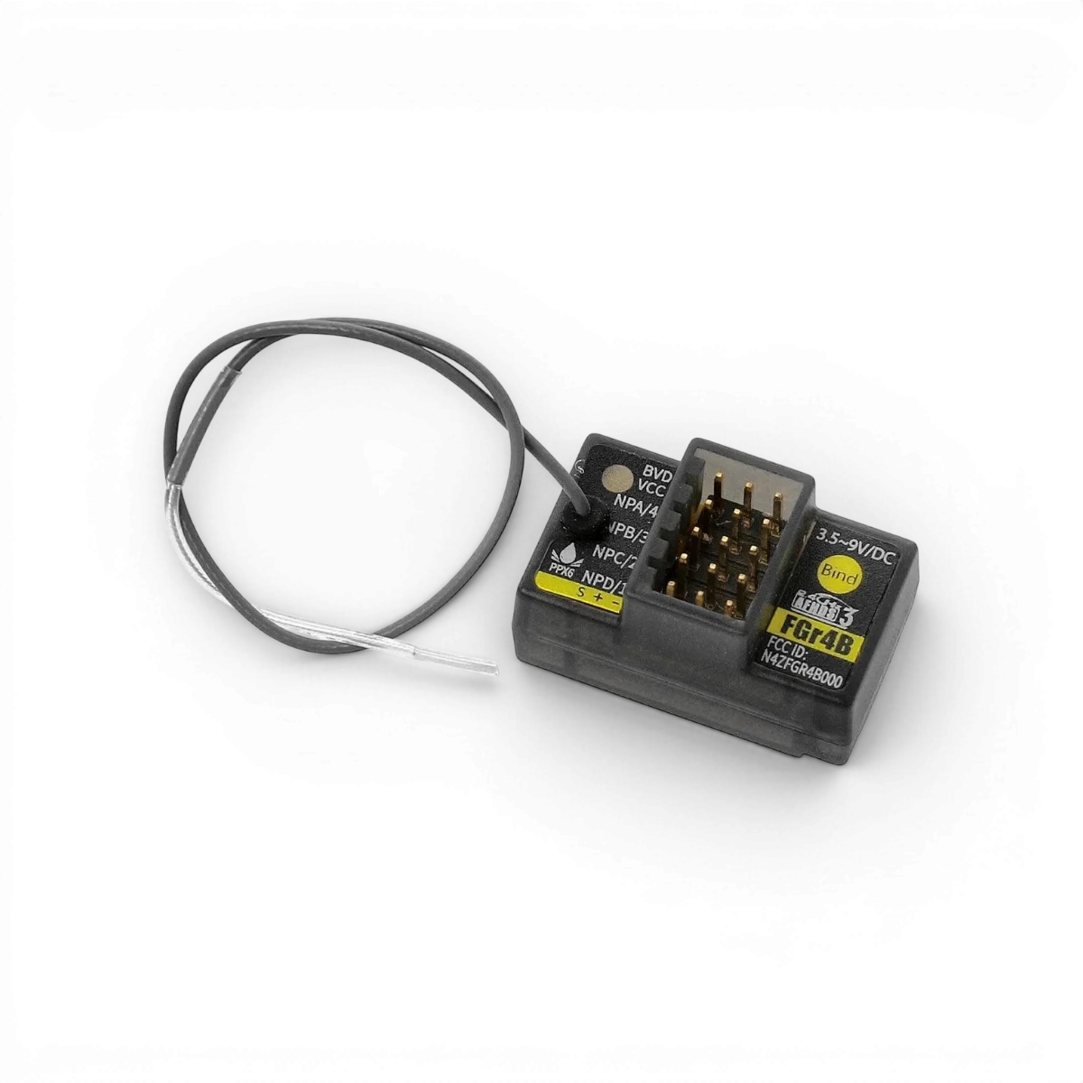 Récepteur Flysky FGr4B AFHDS3 4 canaux pour drone ou radiocommande, interface électronique avec connecteurs visibles.