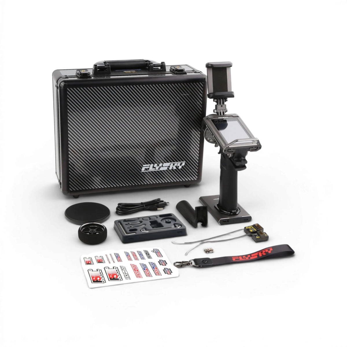 Télécommande FlySky Noble NB4 Pro+ avec 2 récepteurs pour électronique, en vue de face, montrant l'écran et les boutons.