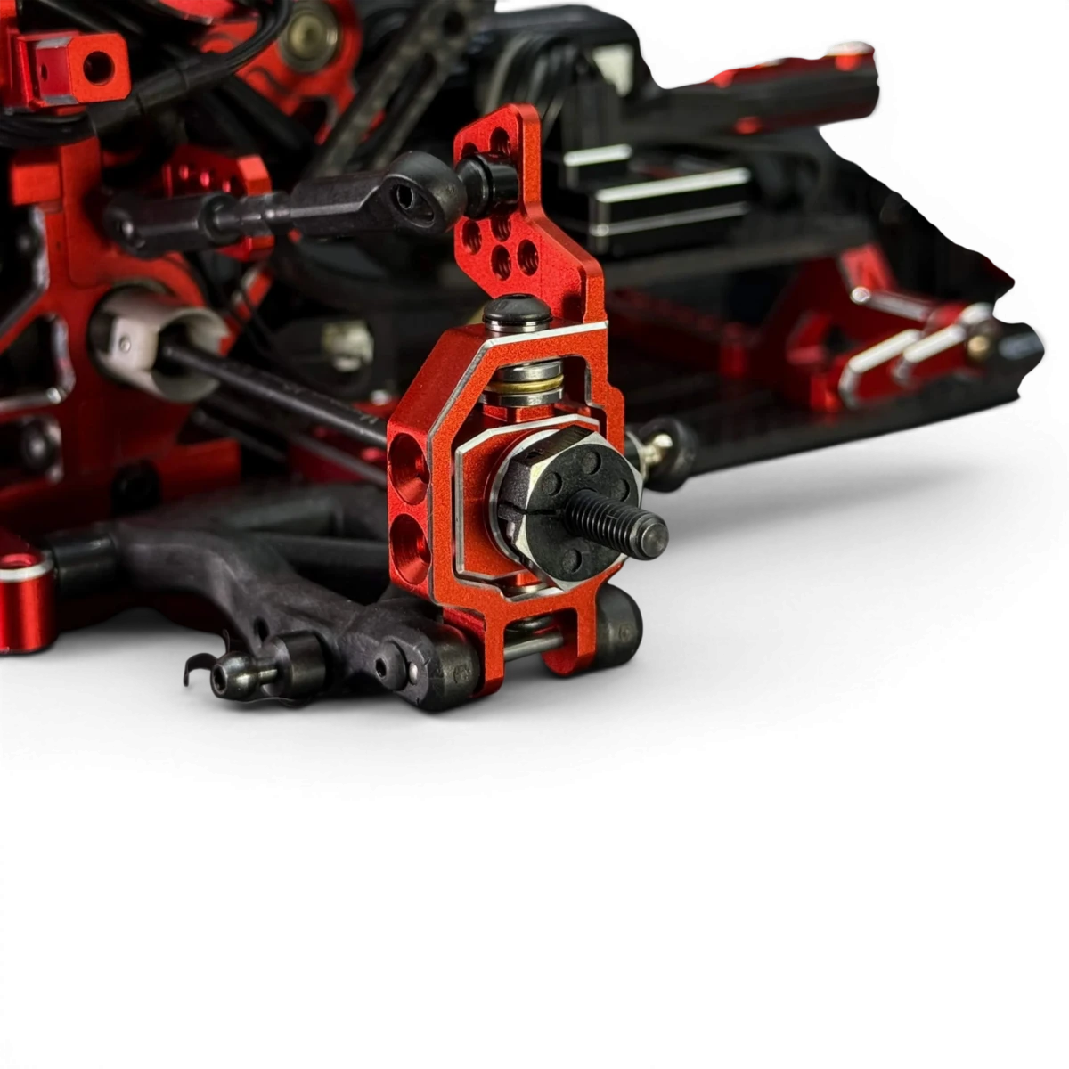 Fusées arrière en aluminium réglables pour voiture RC, marque TEAM AD, avec détails de fixation et design léger.