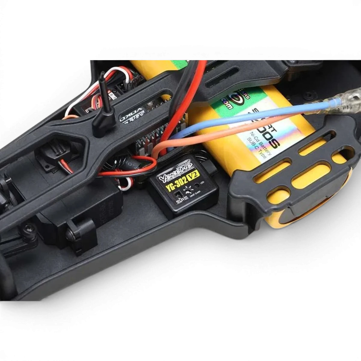 Gyro 3 canaux YG-302V2 de Team Yokomo, composant électronique pour voitures RC, avec réglages précis et design compact.