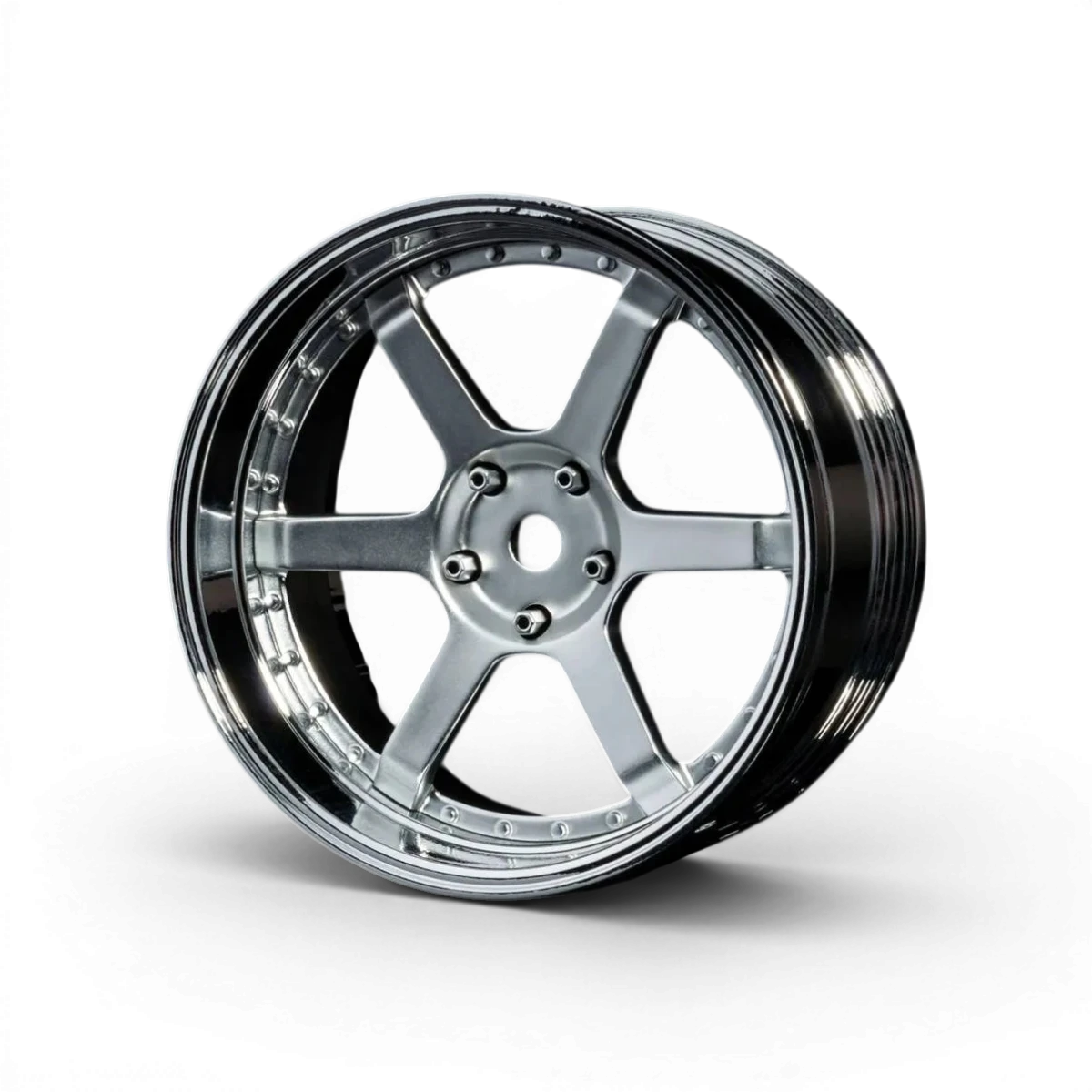 Jantes Max Speed Technology 106 avec offset réglable, finition chrome et gris mat pour véhicules, vue de face.