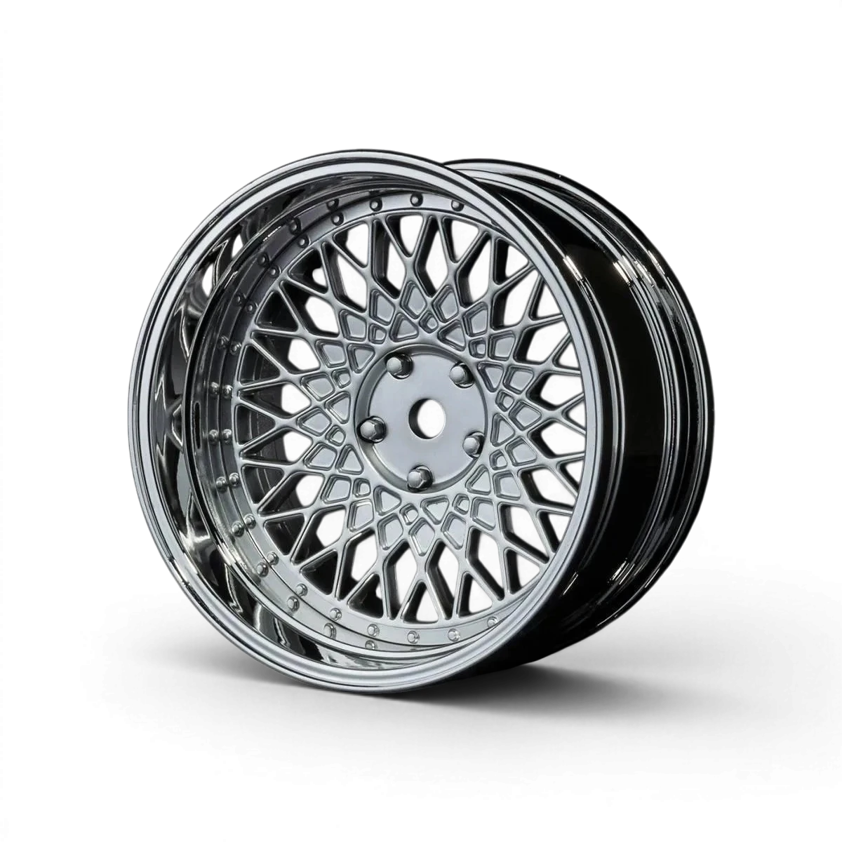 Jantes Max Speed Technology 501 avec offset réglable, finition chrome et gris mat, vue en gros plan sur la surface.