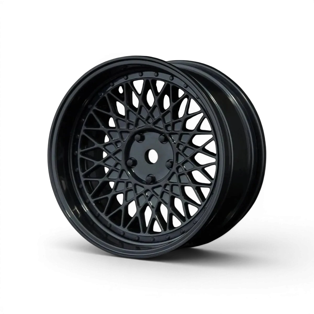 Jantes Max Speed Technology 501 avec offset réglable, finition noire, montées sur une roue de voiture.