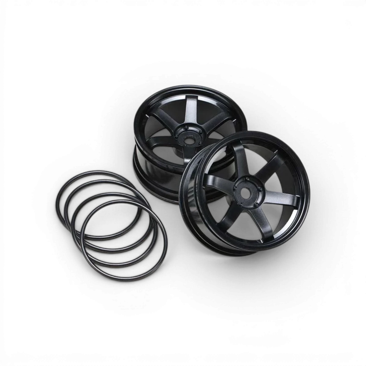 Jantes 6 branches pour drift de marque Team Yokomo, offset 7, finition noire, vue en gros plan.