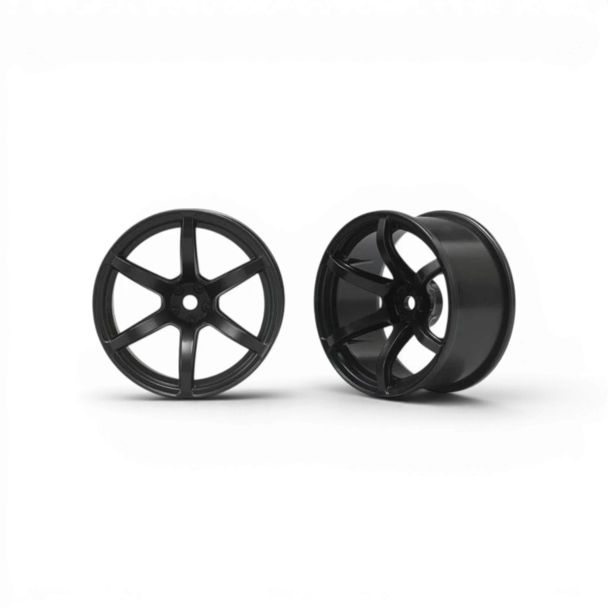 Jantes 6 branches Racing Performer Offset 8 noires pour voiture RC, de marque Team Yokomo, avec design sportif et finition noire.