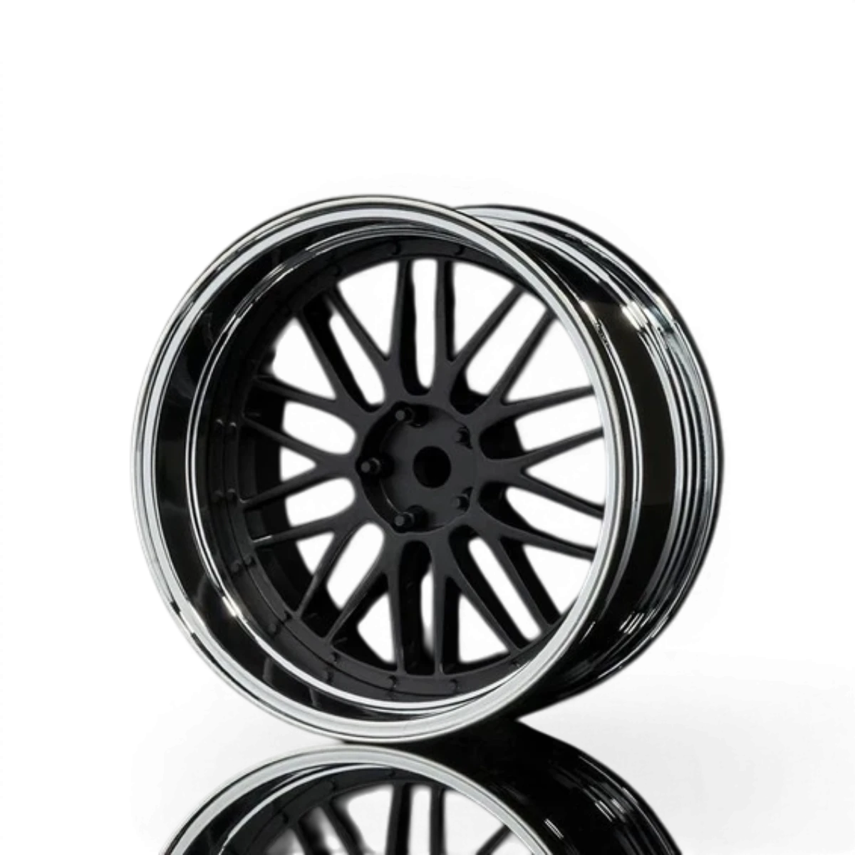 Jeu de 4 roues Max Speed Technology LM avec offset réglable, finition noire mate et chrome, pour voitures sportives.