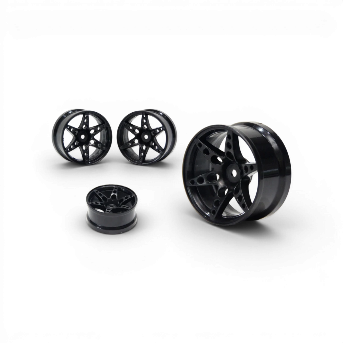 Jantes R1 déport +6mm noires pour voiture RC, customisation par Src Sideways RC, vue de face avec détails des jantes.