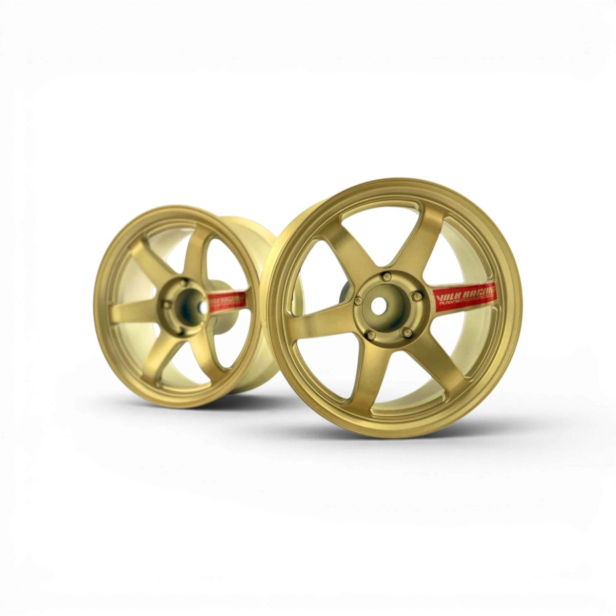 Jantes TE37 haute traction en or métallisé, rouleaux pour voiture, fabriquées par Custom lab's, vue en gros plan.