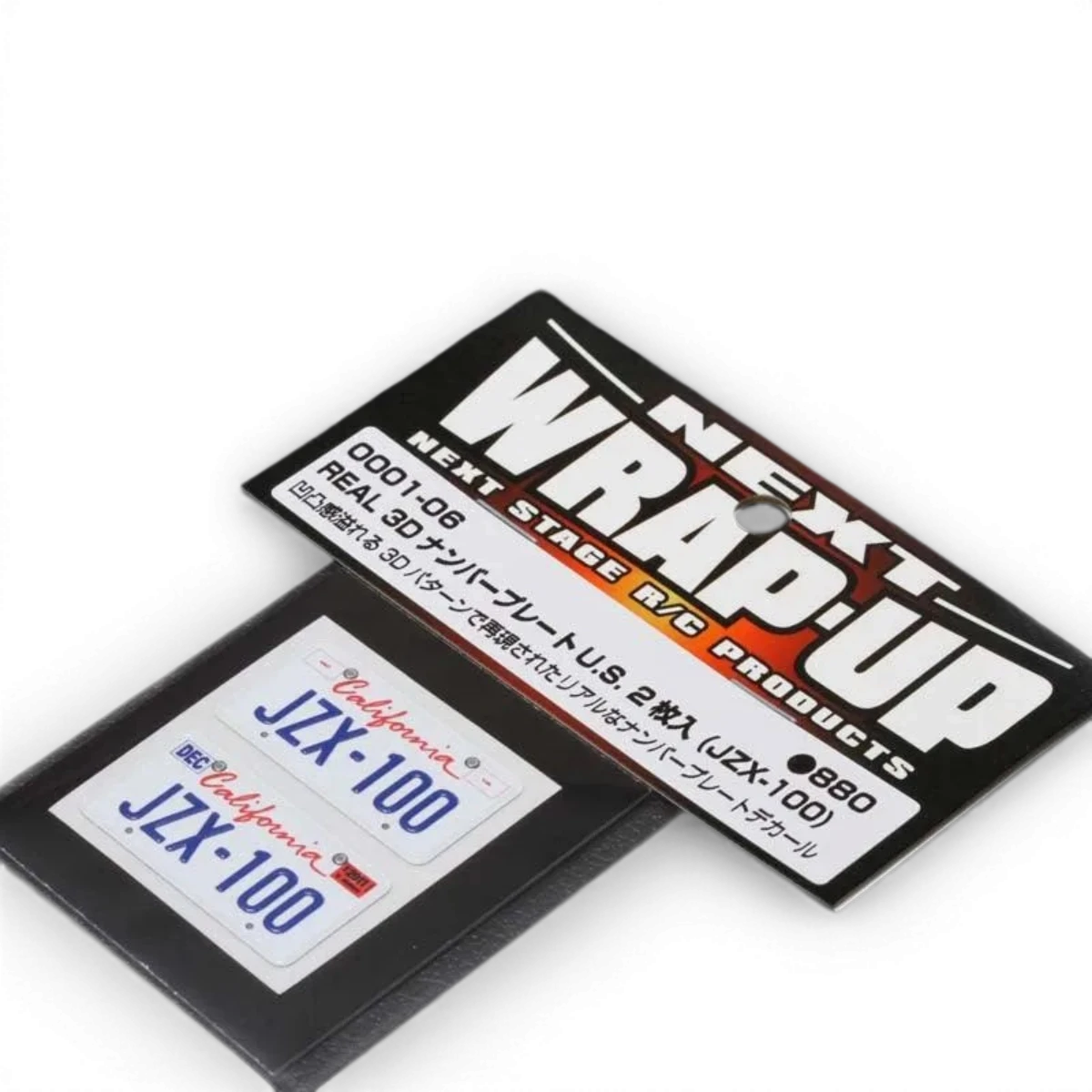 Plaque d'immatriculation autocollante JZX-100 de la marque Wrap-UP Next, designée pour customisation de véhicules.