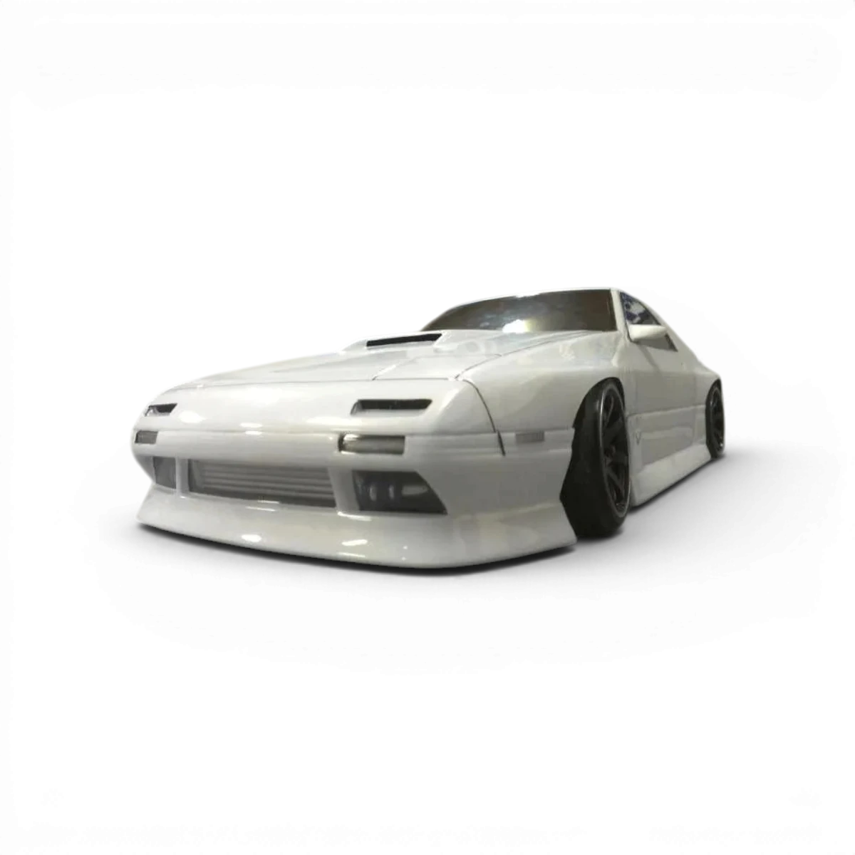 Kit aérodynamique Topline pour Mazda RX7 FC3S, carrosserie avec aile et éléments de style, en plastique noir.