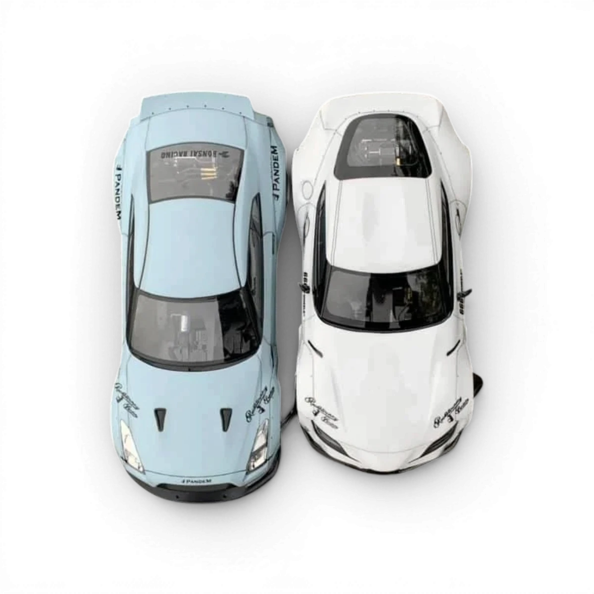 Kit de conversion RC Drift 275mm pour Nissan GTR, conçu par Addiction RC Design, avec pièces visibles pour modifications.