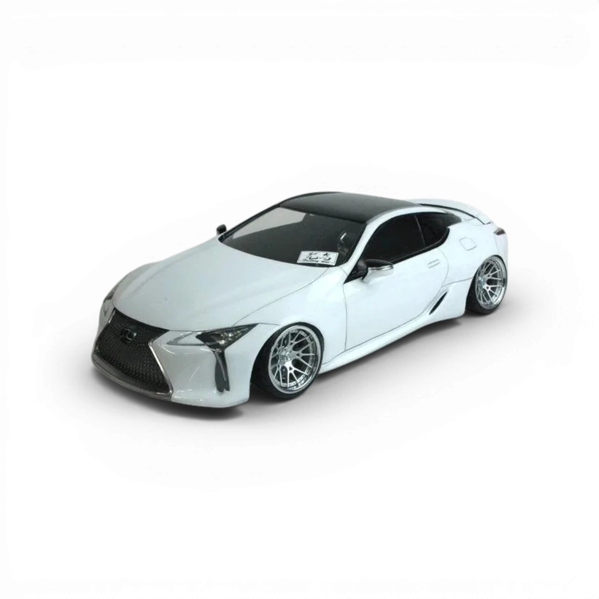 Voiture radiocommandée Lexus LC Pandora RC avec carrosserie détaillée, vue de côté sur fond blanc.