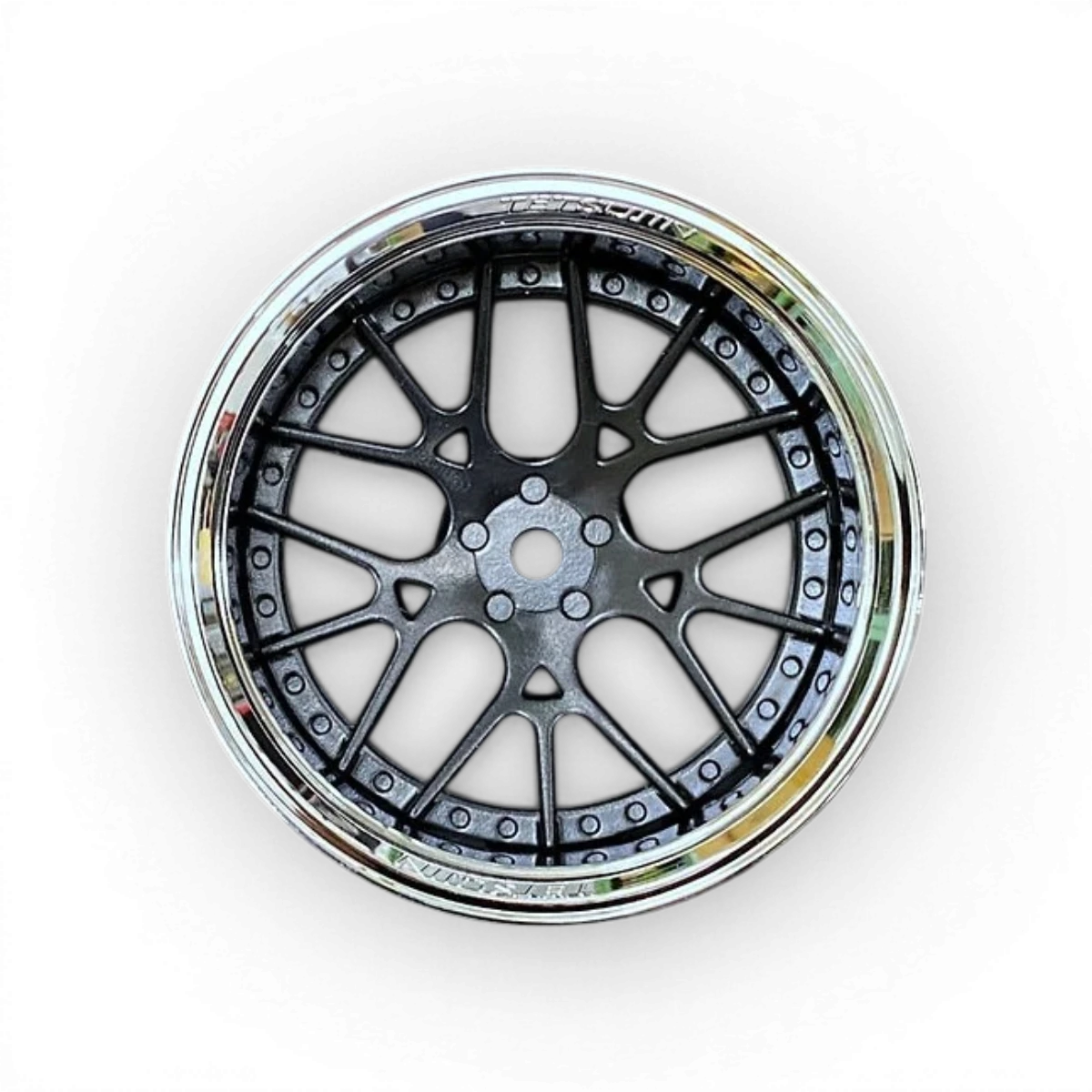Roues Tetsujin Lycoris en chrome et noir, vue détaillée du set de roues pour vélo ou moto.