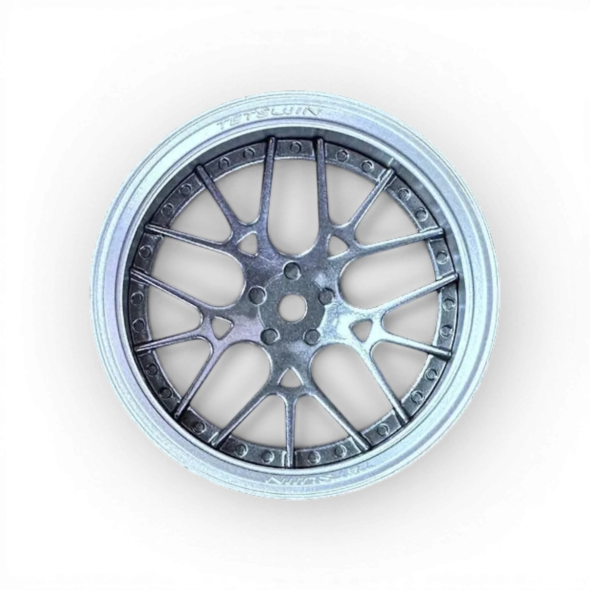 Roues Tetsujin Lycoris en métal gris foncé, design robuste, parfaites pour vélo ou moto, visibles en détail dans l'image.