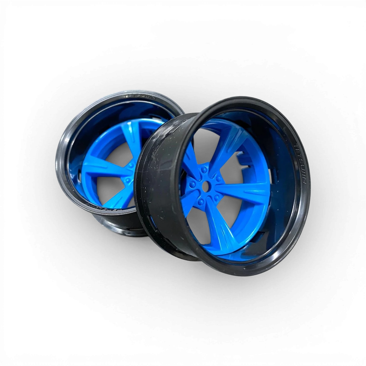 Roues Tetsujin Mandarin noir et bleu pour voiture, design sportif et moderne, vues en gros plan sur le set complet.