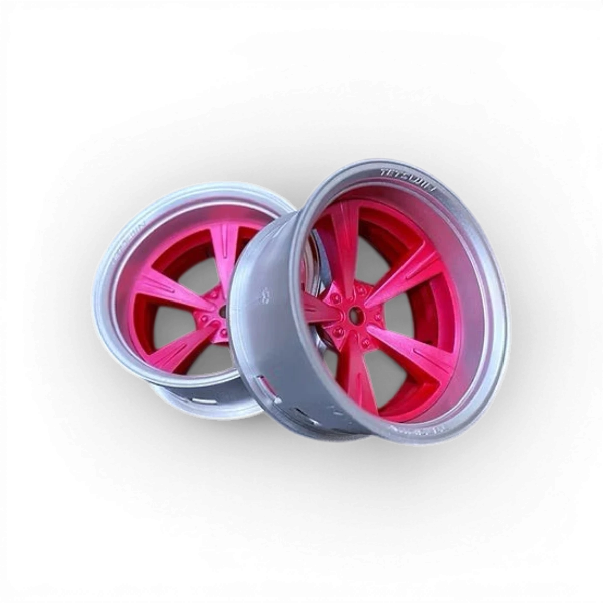 Roues Mandarin Silver et Rose de la marque Tetsujin, élégantes avec finitions métalliques pour skateboard ou scooter.