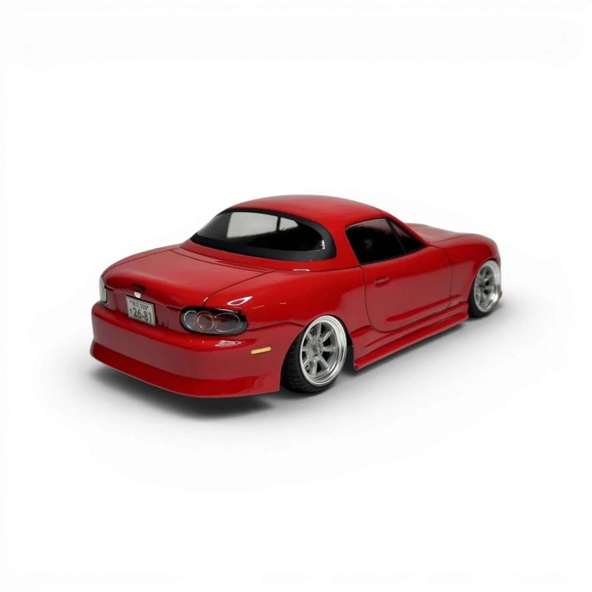 Carrosserie Mazda MX5 NB pour voiture RC de la marque Aplastics RC, en détail avec finition précise.